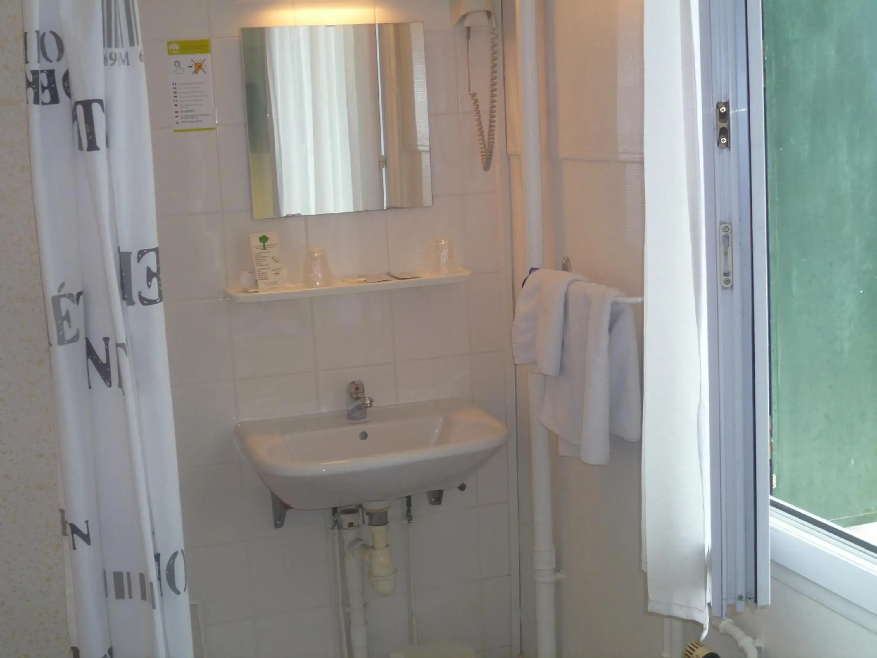 Shower, Bathroom in Hôtel Beauséjour