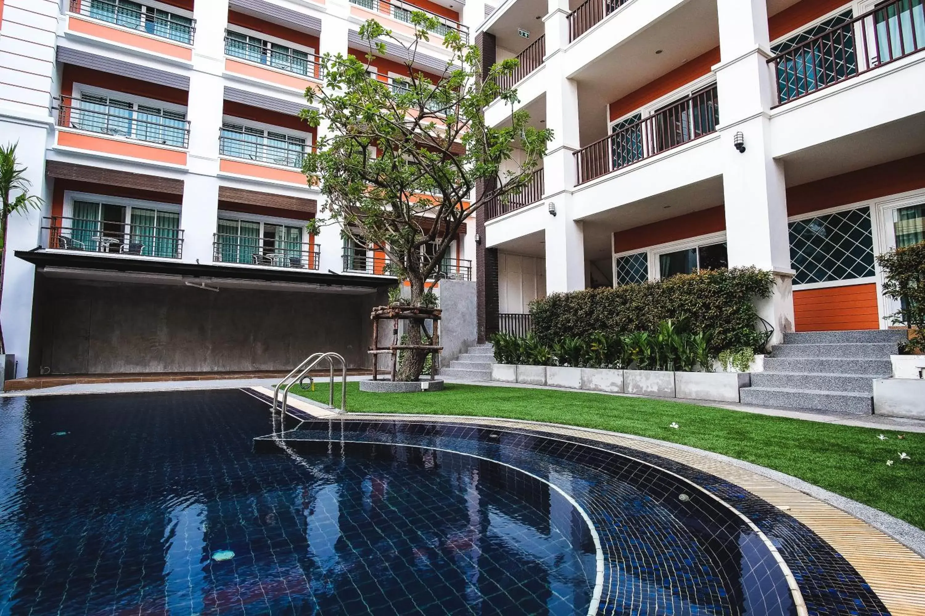 Swimming pool, Property Building in FX Hotel Pattaya