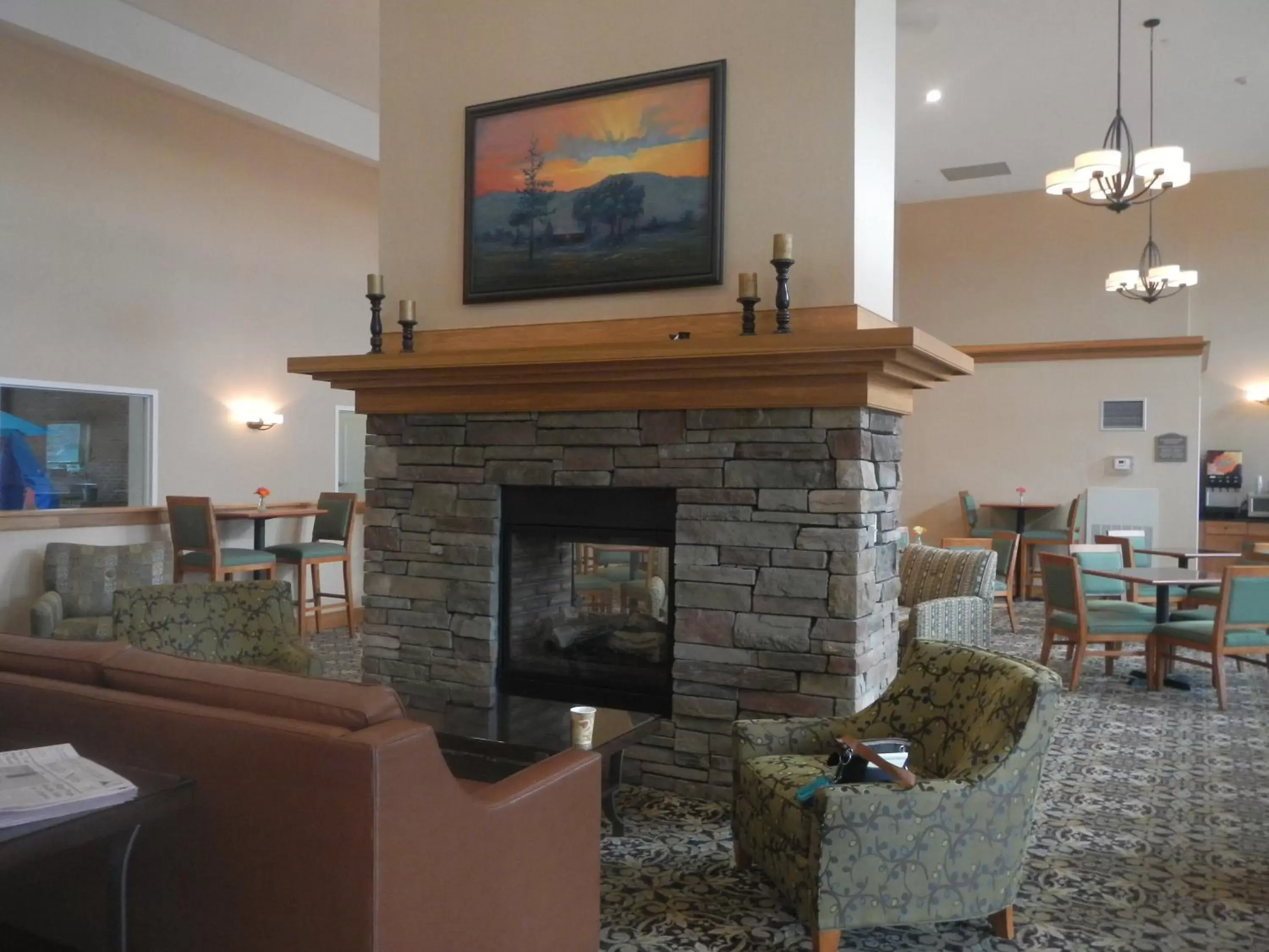 Communal lounge/ TV room, Seating Area in White River Inn & Suites