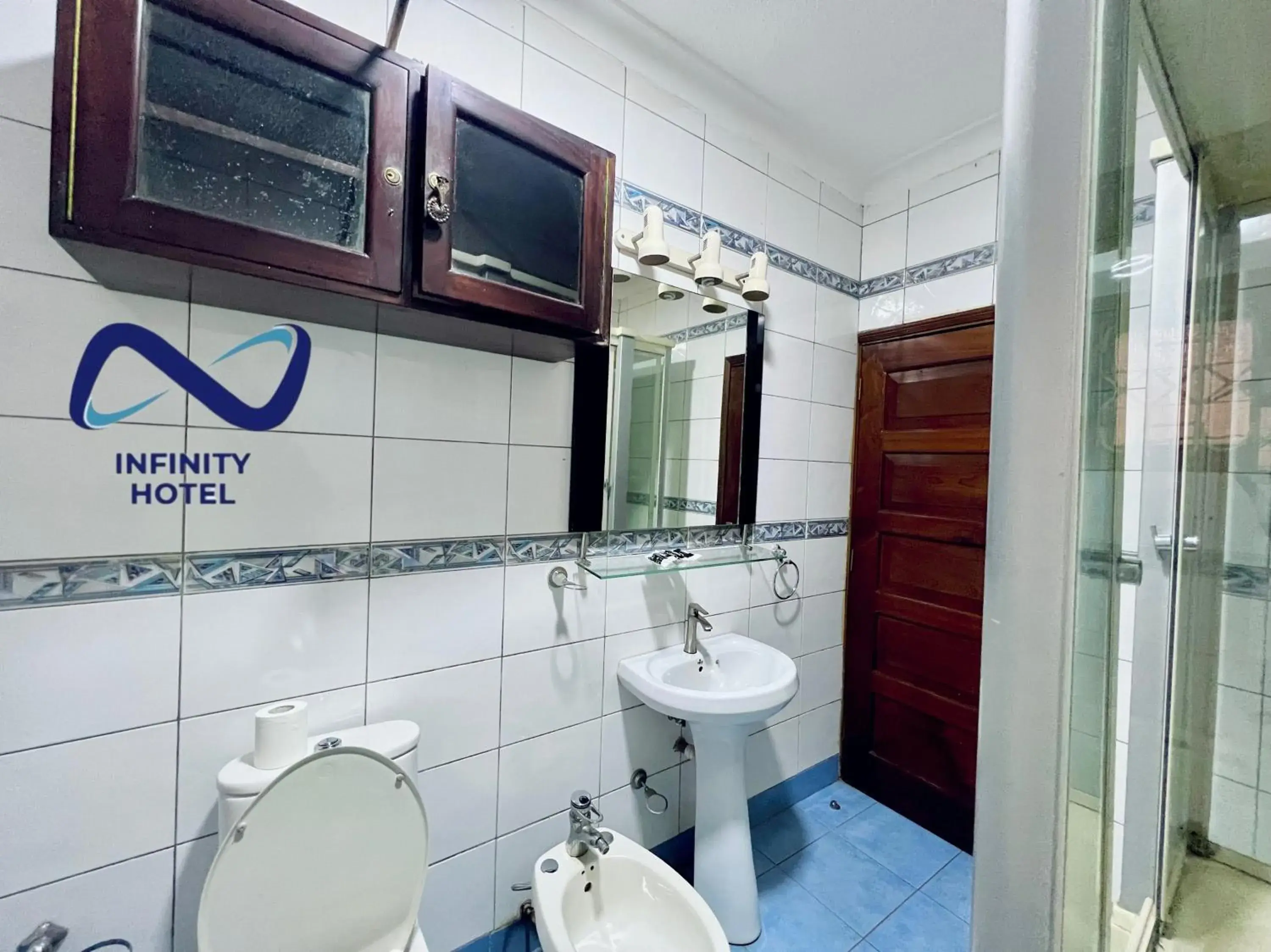Shower, Bathroom in Infinity Hotel Kampala