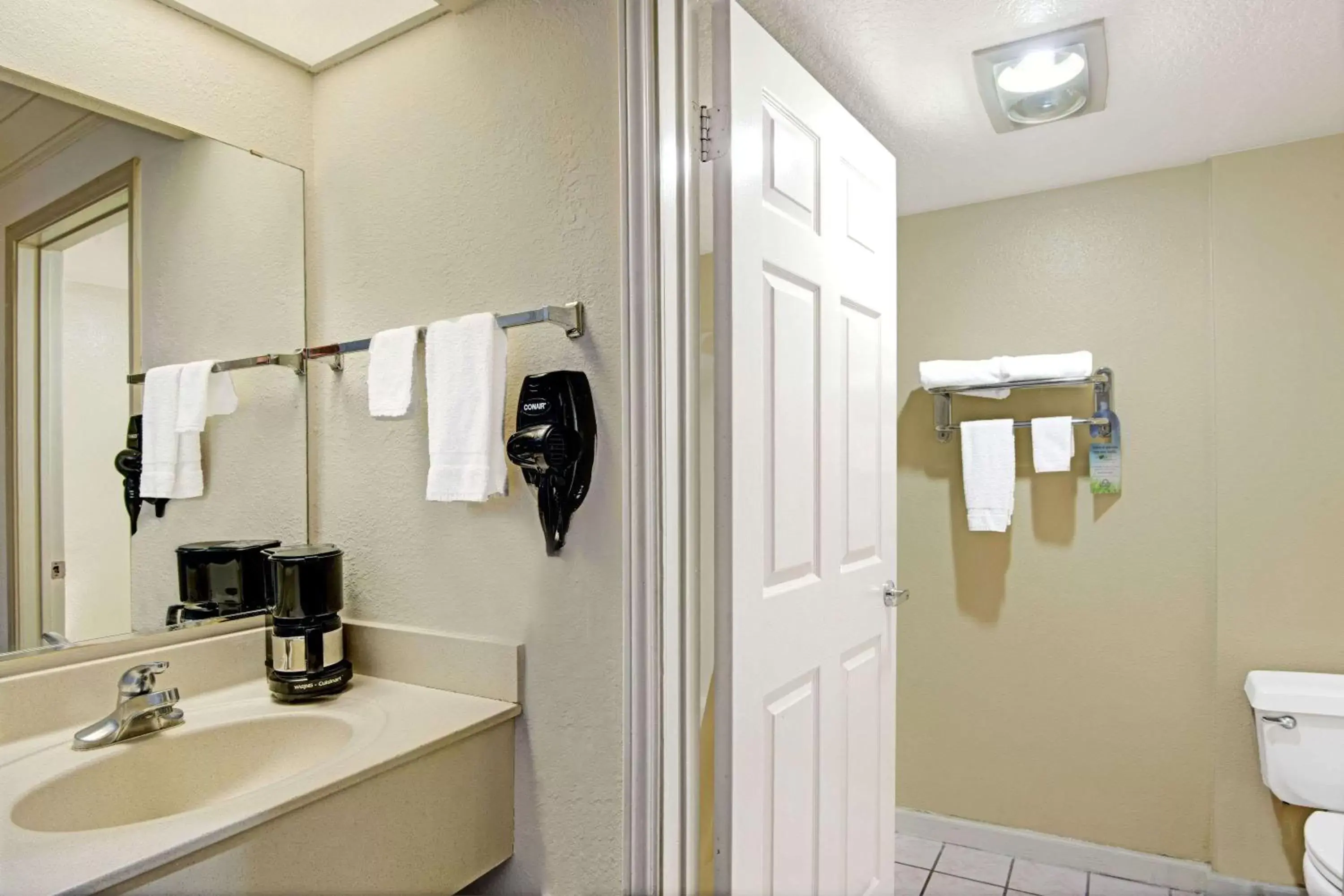 Bathroom in Days Inn by Wyndham San Antonio Airport