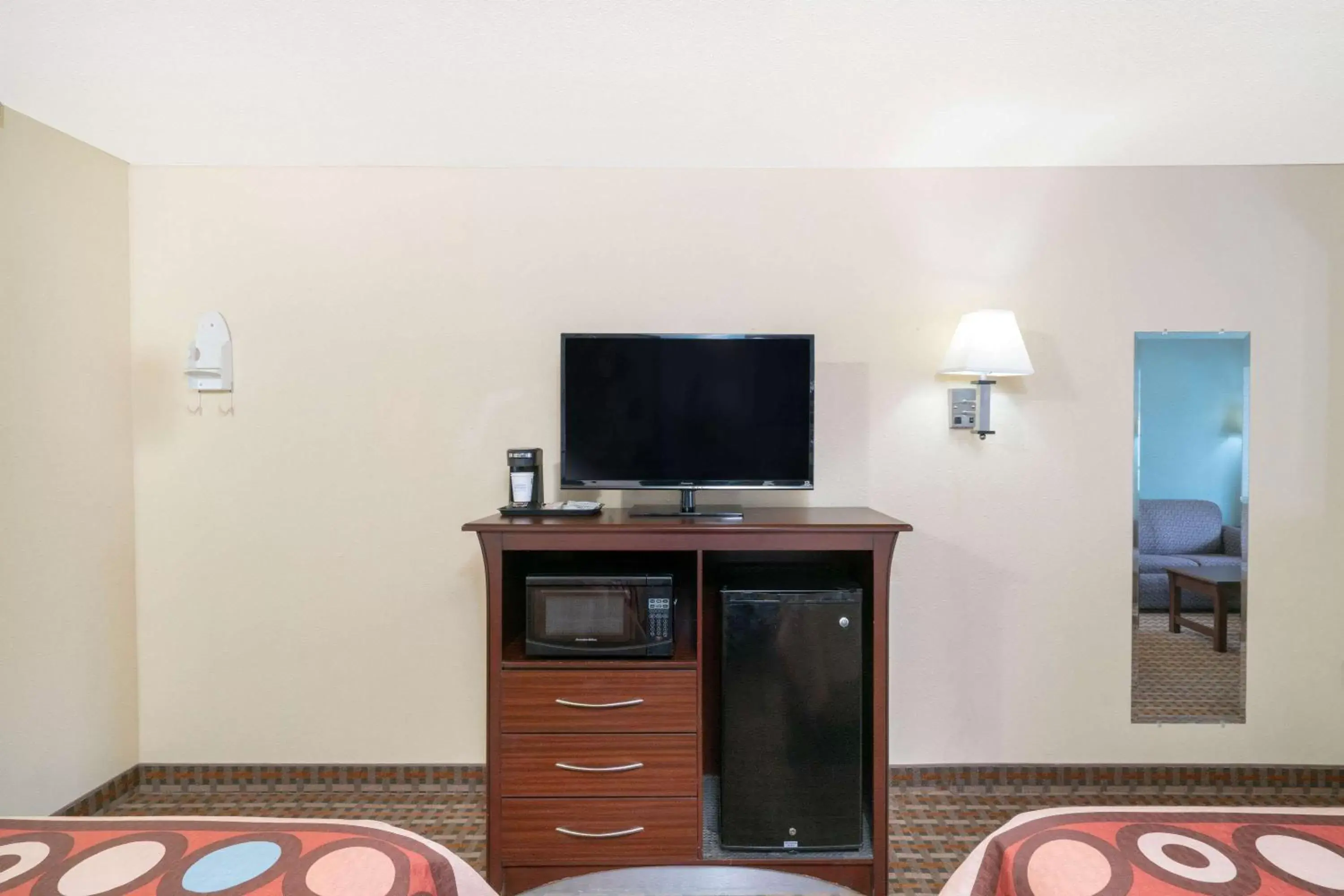 Photo of the whole room, TV/Entertainment Center in Super 8 by Wyndham North Little Rock/McCain
