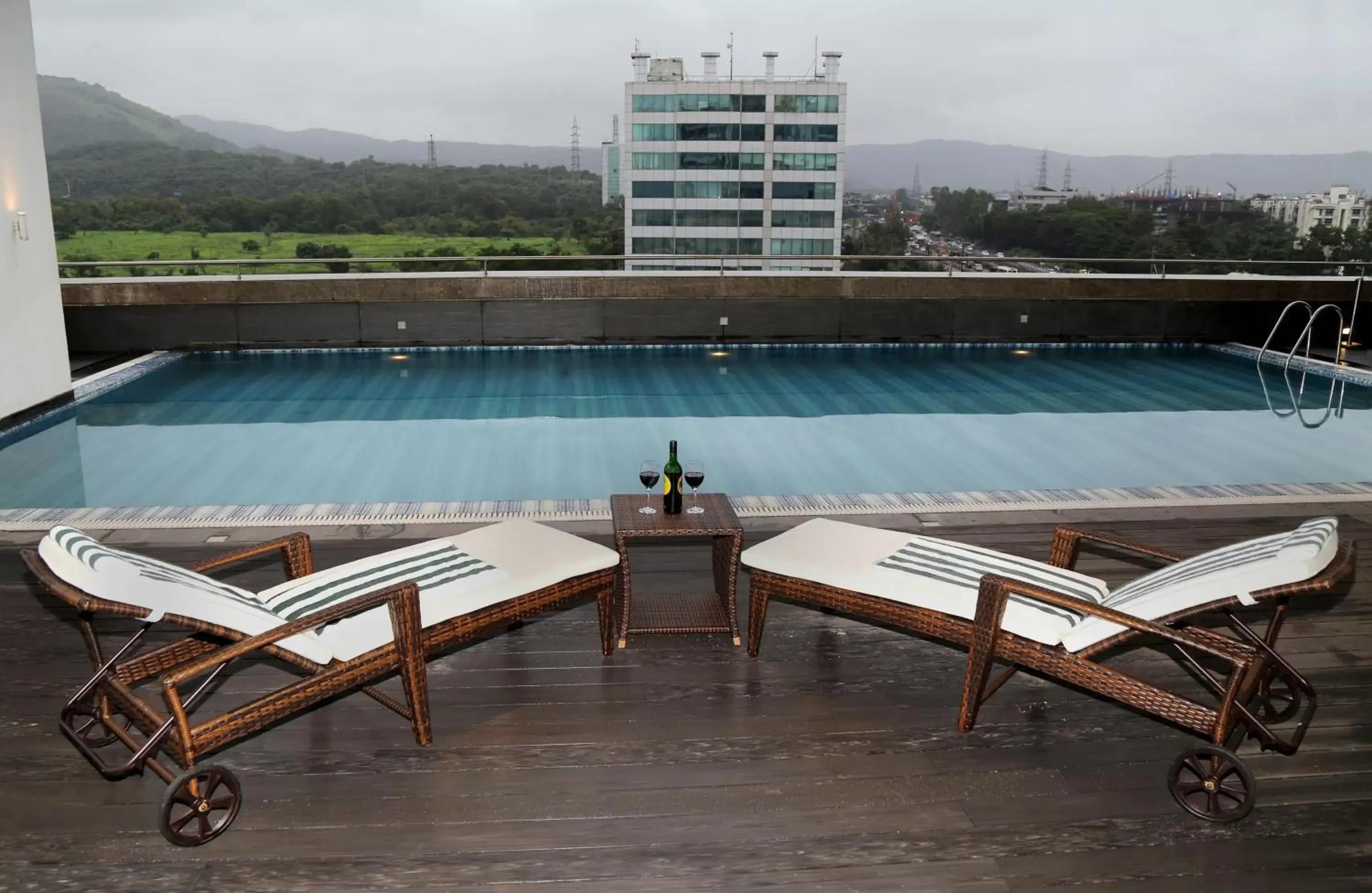 Mountain view, Swimming Pool in Country Inn & Suites By Radisson Navi Mumbai