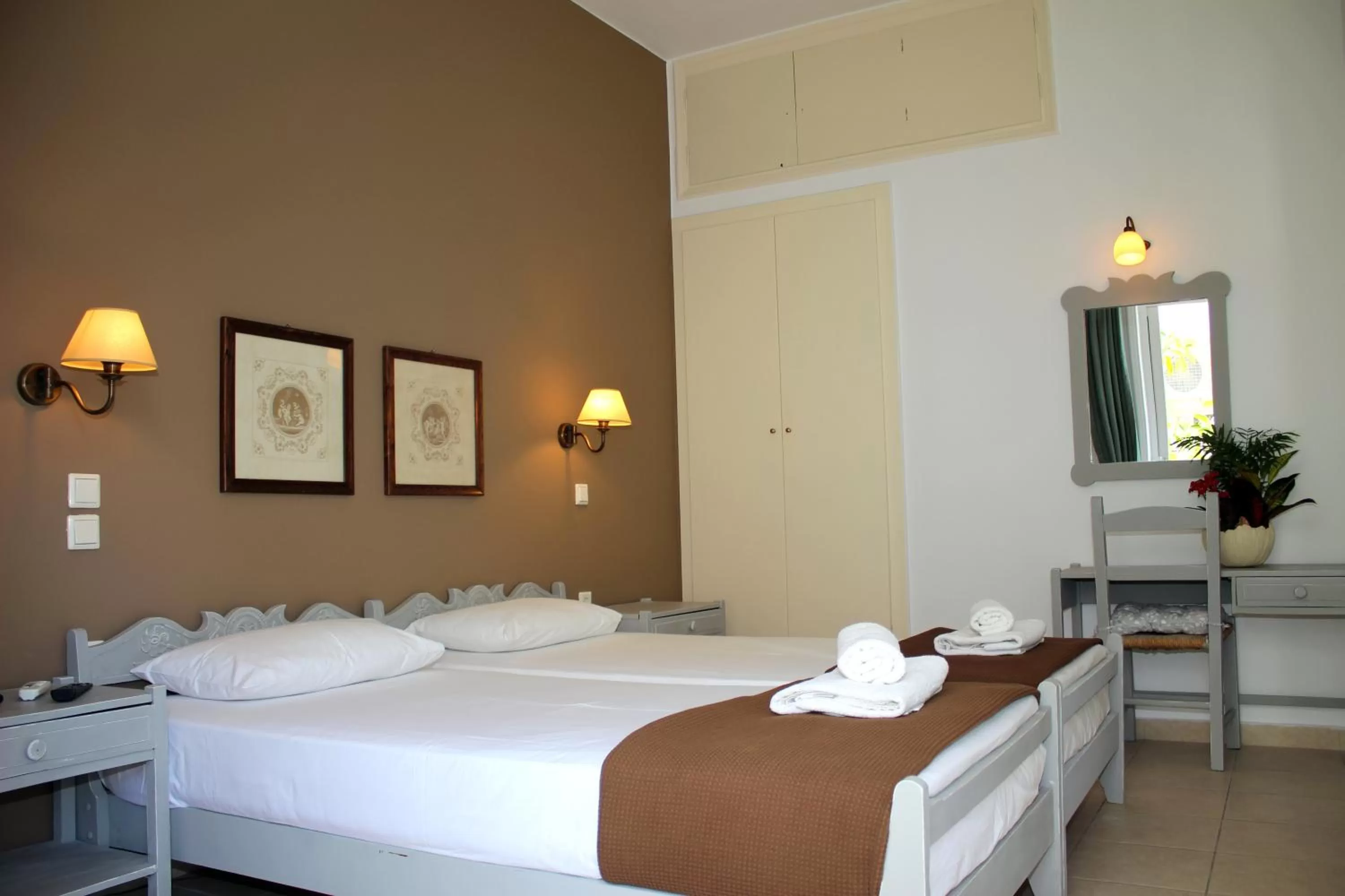 Bed in Ikaros Art Hotel