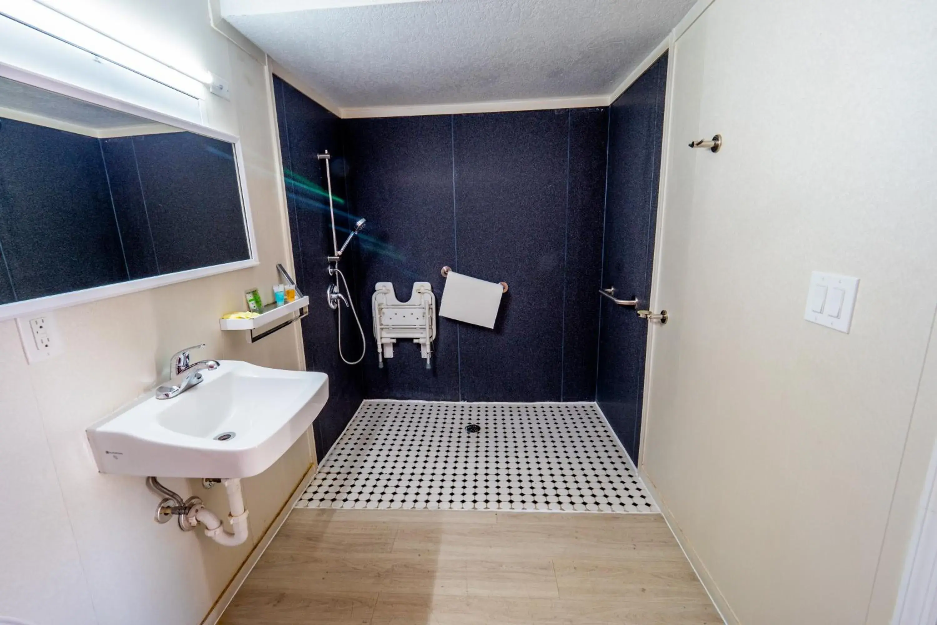 Bathroom in Travelodge by Wyndham Orlando at Heart of International Drive