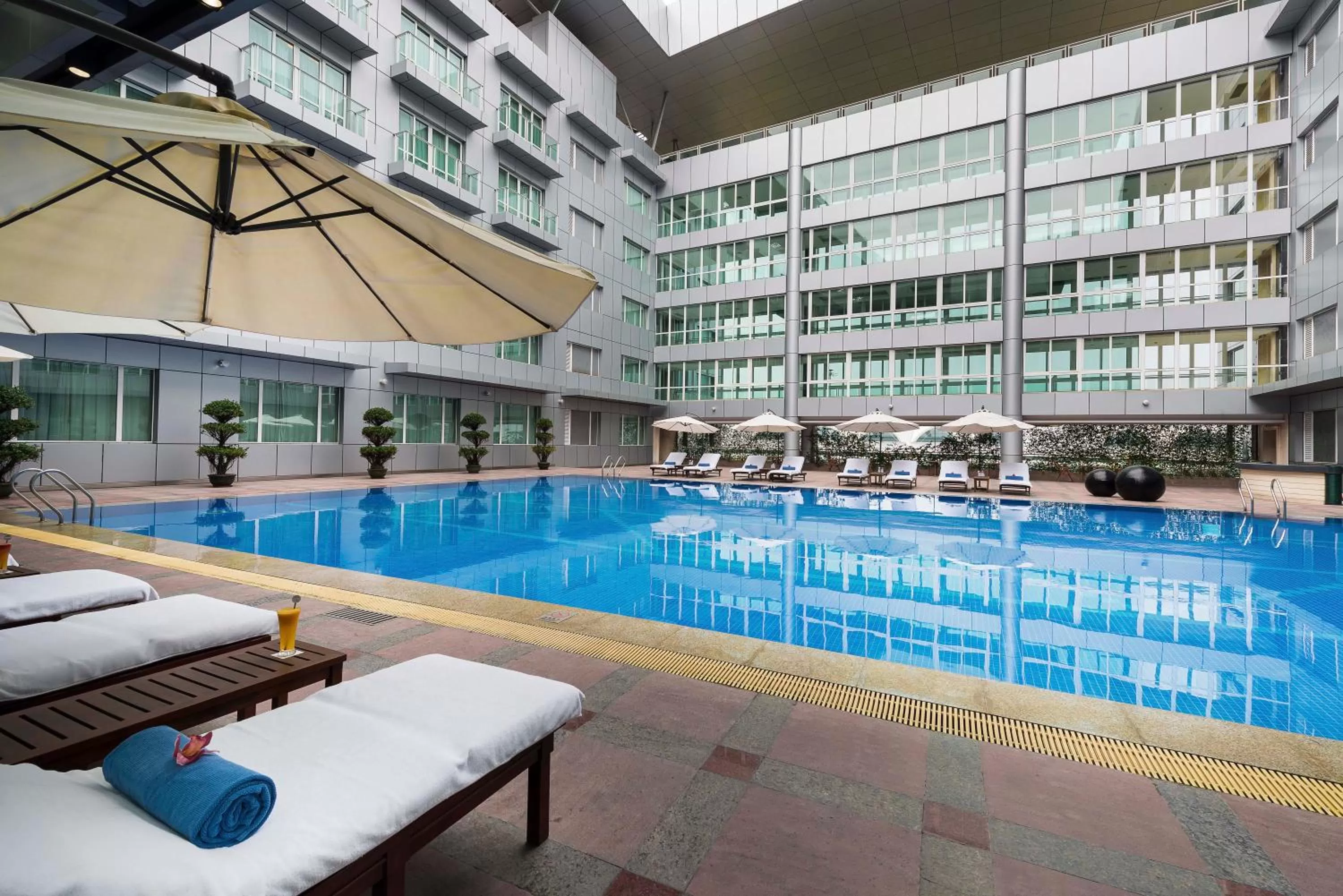 Swimming pool in Pullman Guangzhou Baiyun Airport - Free Shuttle Bus & Official Registration Agency during Canton Fair