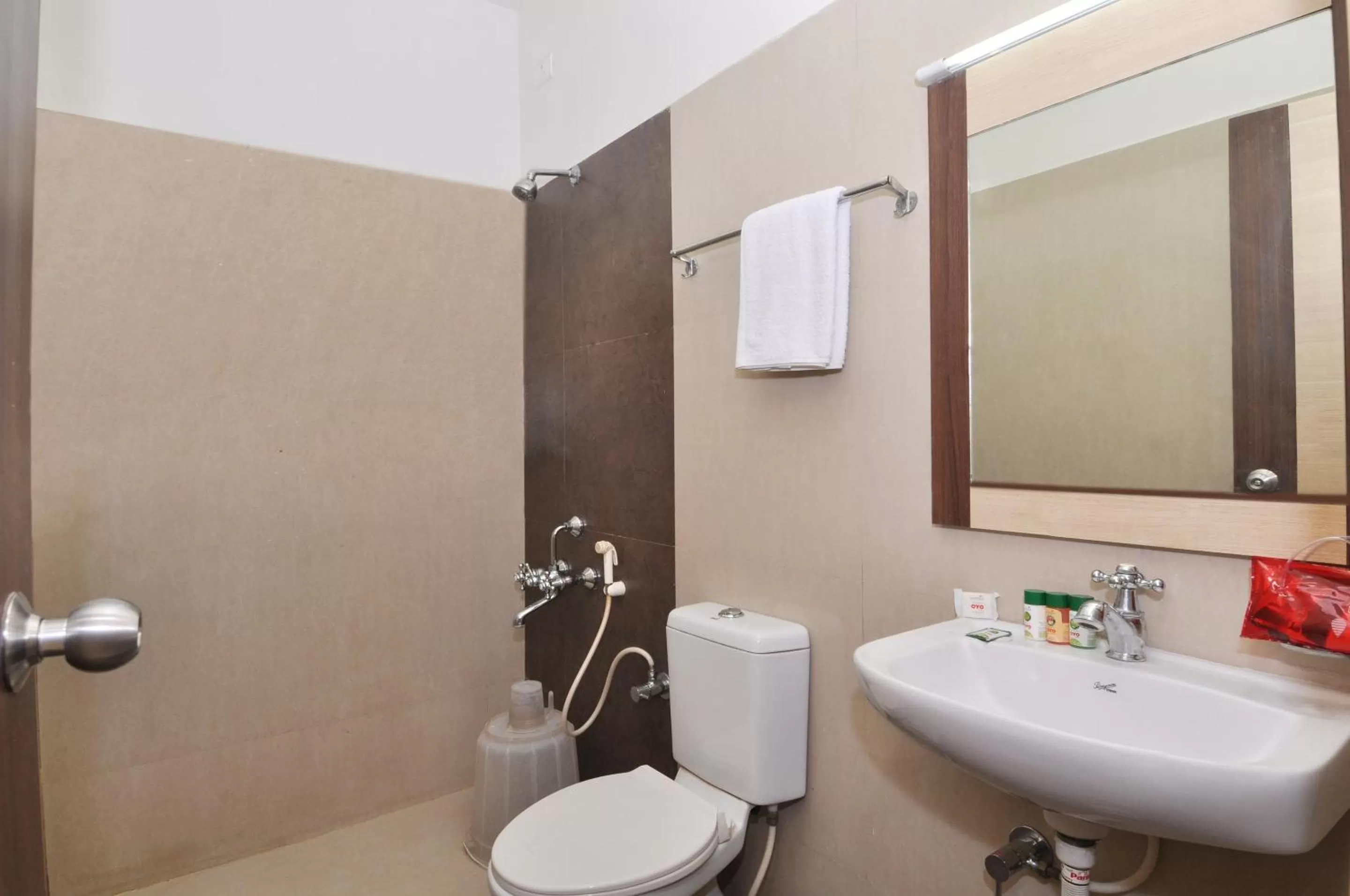 Bathroom in Sivamurugan Hotels
