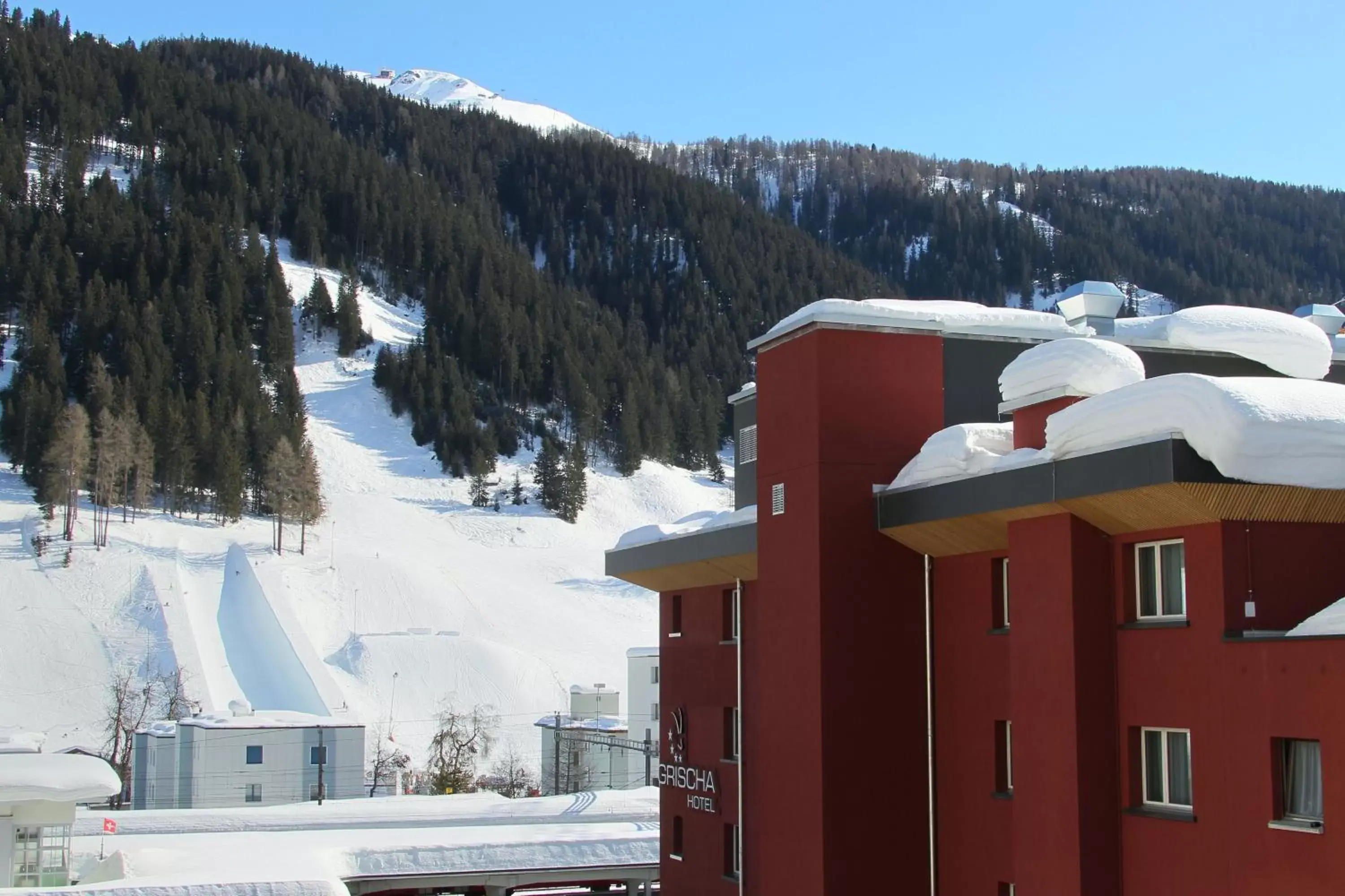 Facade/entrance, Winter in Grischa - Das Hotel Davos