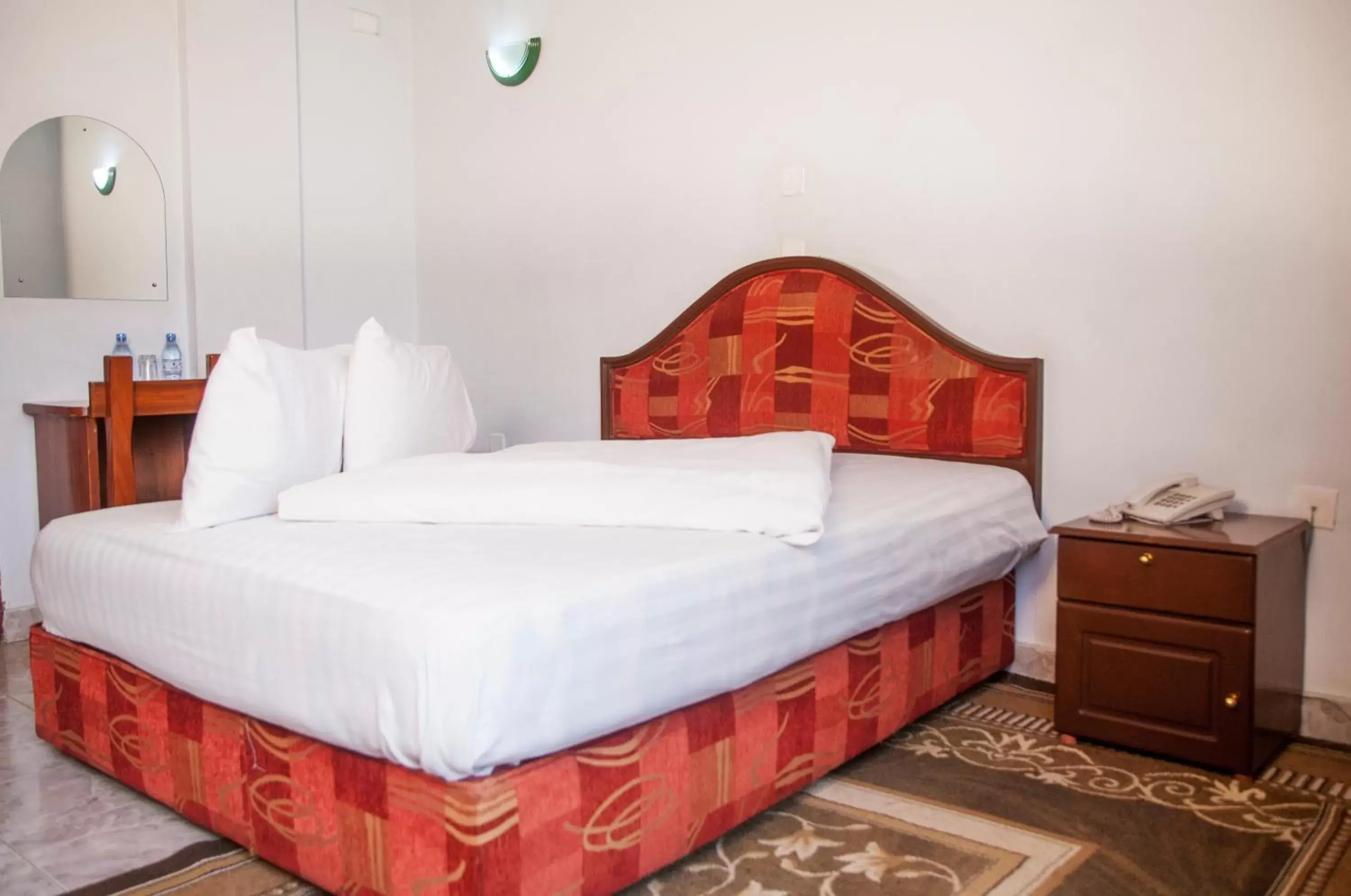 Bed in Natron Palace Hotel