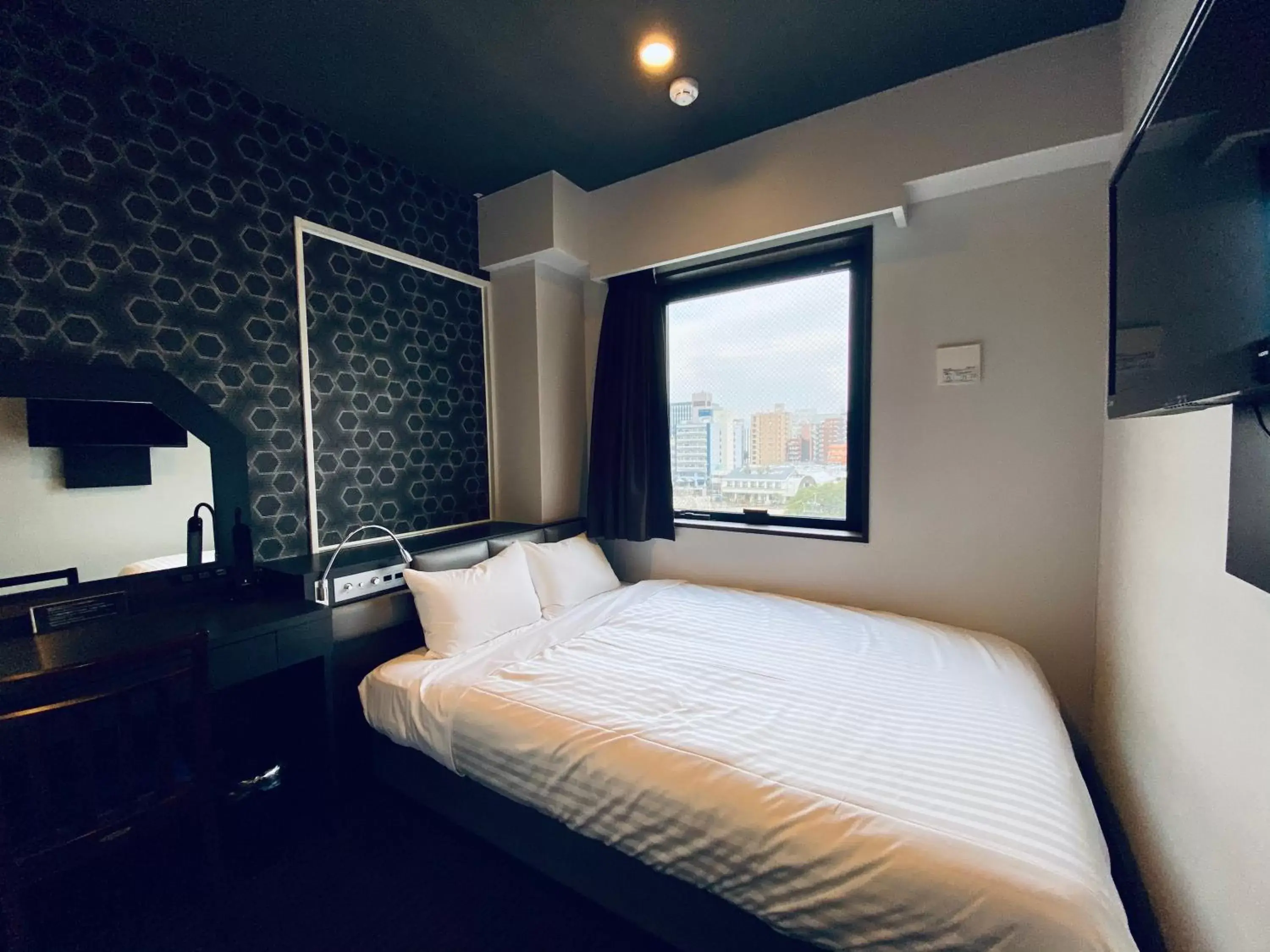 Photo of the whole room, Bed in Hotel Hulaton Fukuokahakata