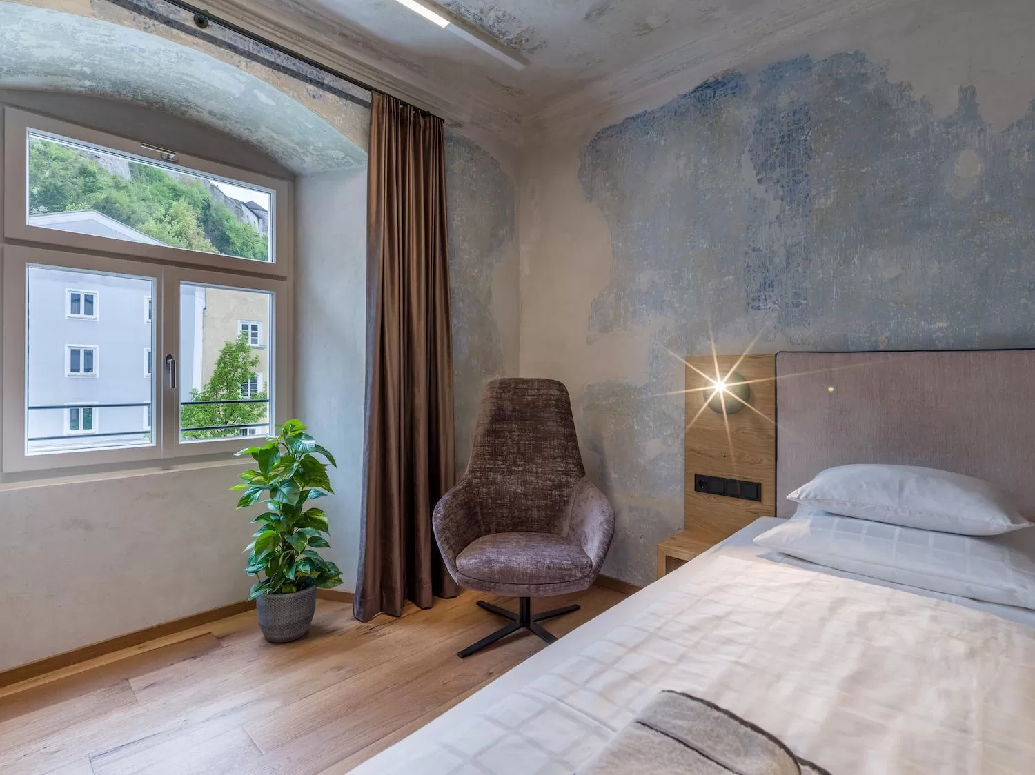 Seating area, Bed in Platzhirsch Kufstein