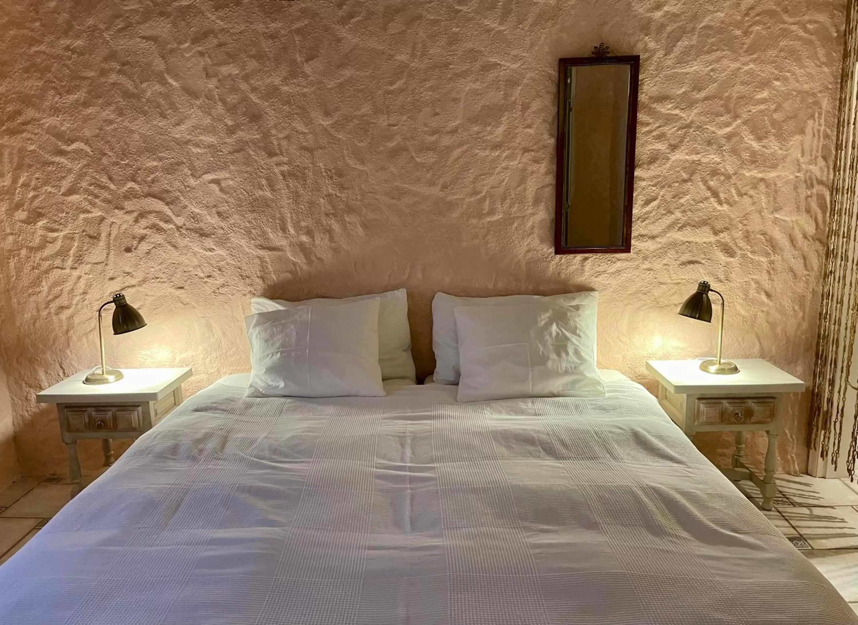 Bed in Sansofi Guesthouse