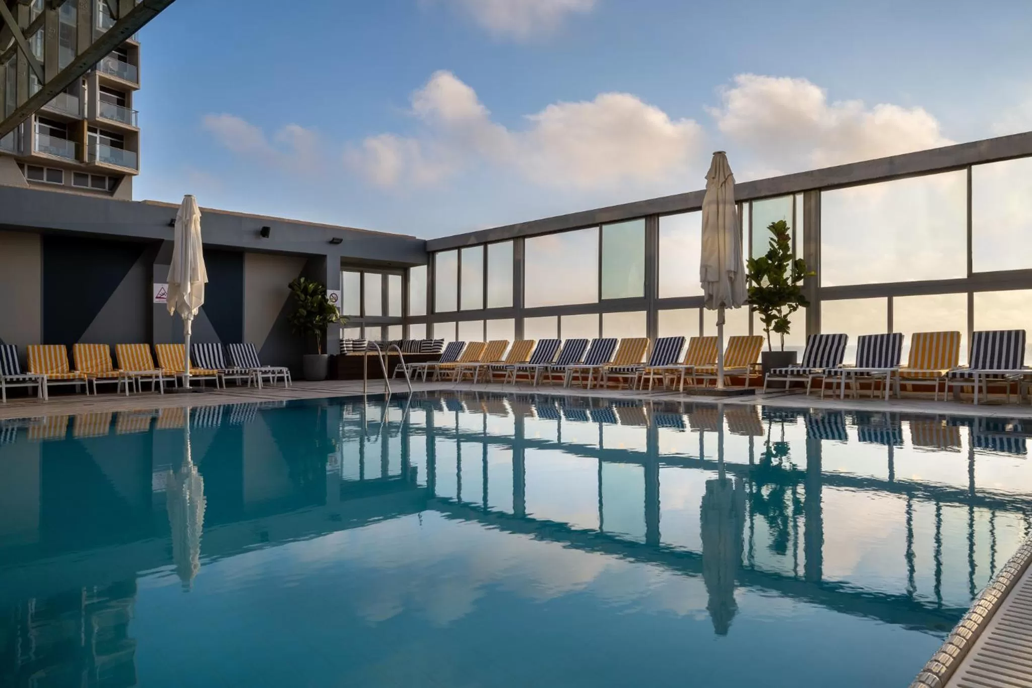 Swimming pool in Crowne Plaza Tel Aviv Beach by IHG