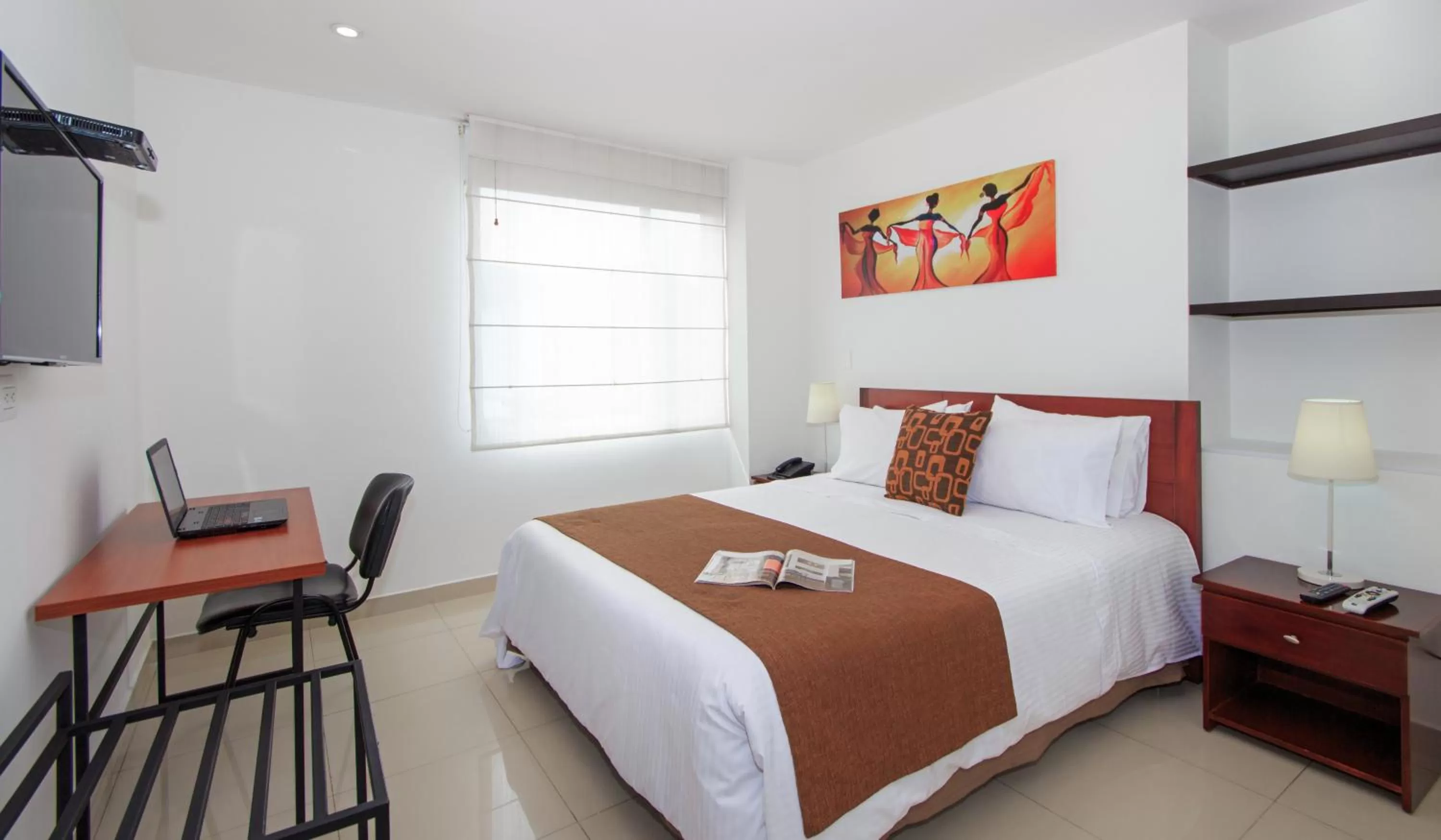 Bed in 122 Plaza Apartahotel