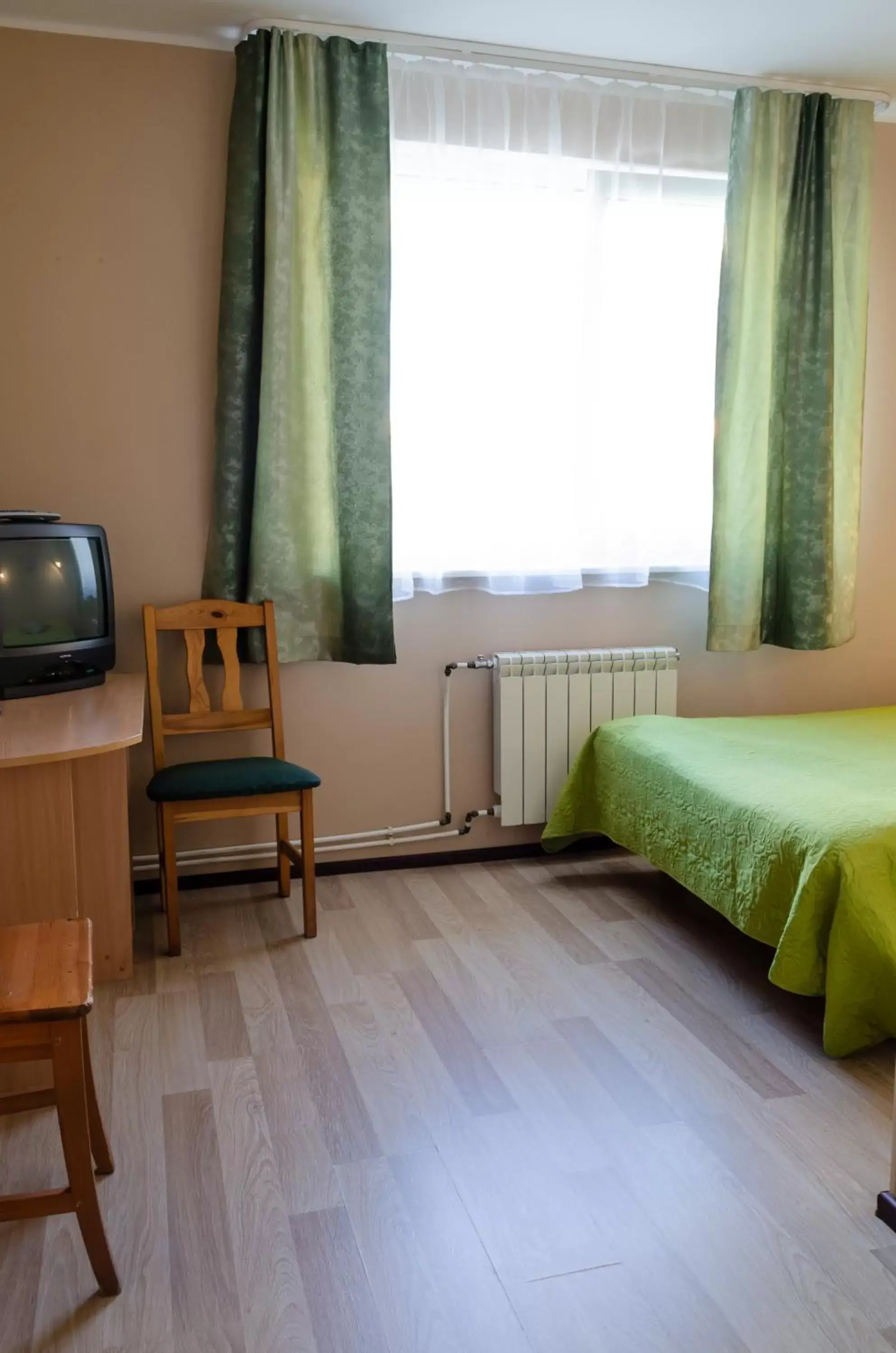 Bed, Seating Area in Lilleküla Hotel