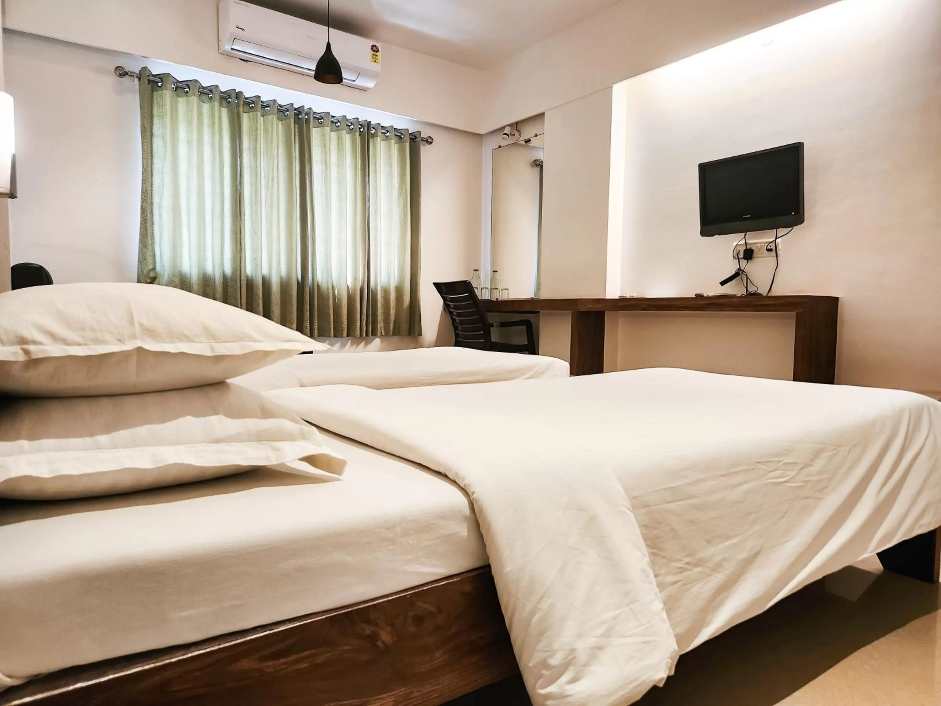 Bed in Hotel Rajwada Aurangabad