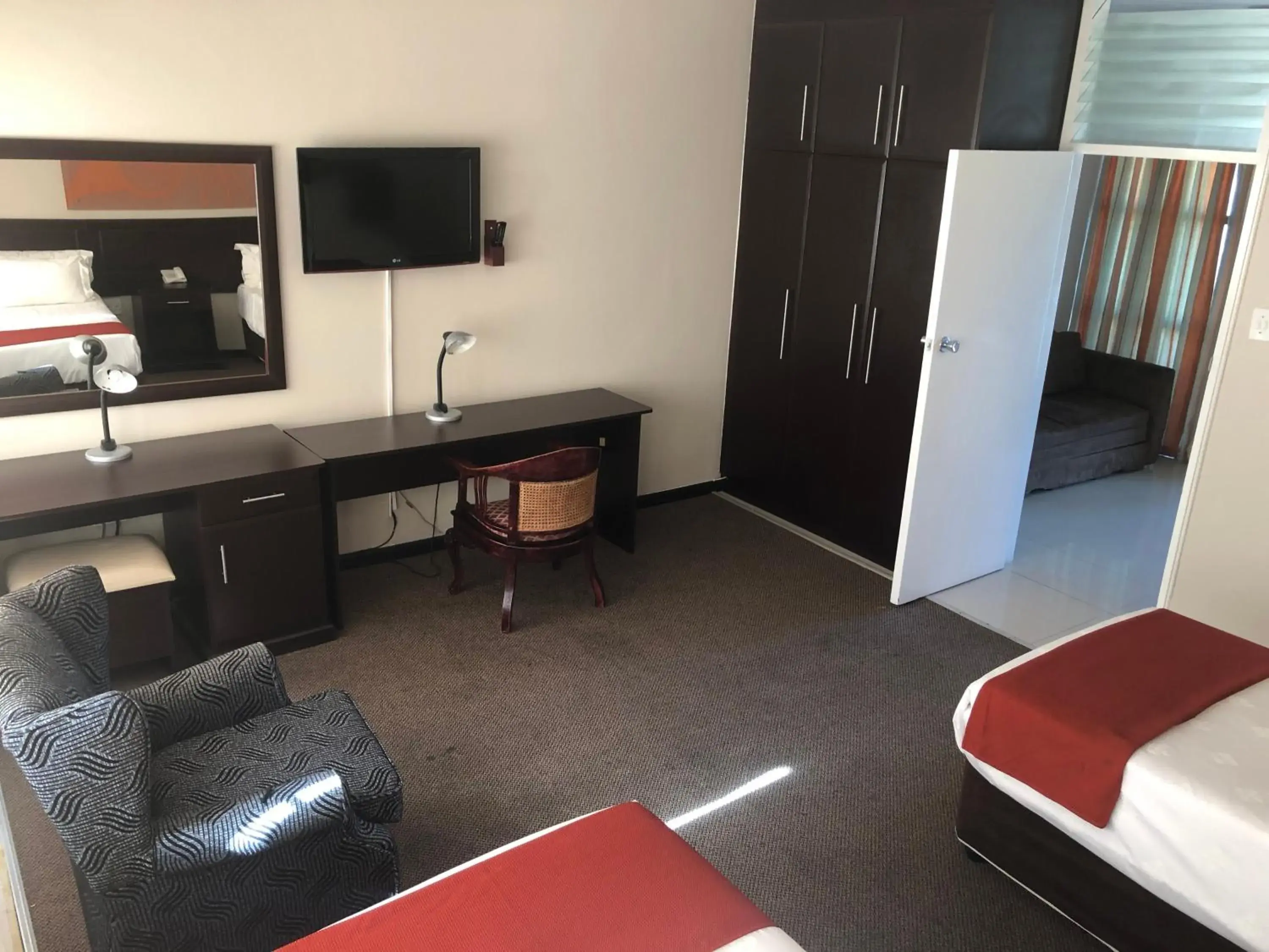 Bed, TV/Entertainment Center in Coastlands Durban Self Catering Holiday Apartments