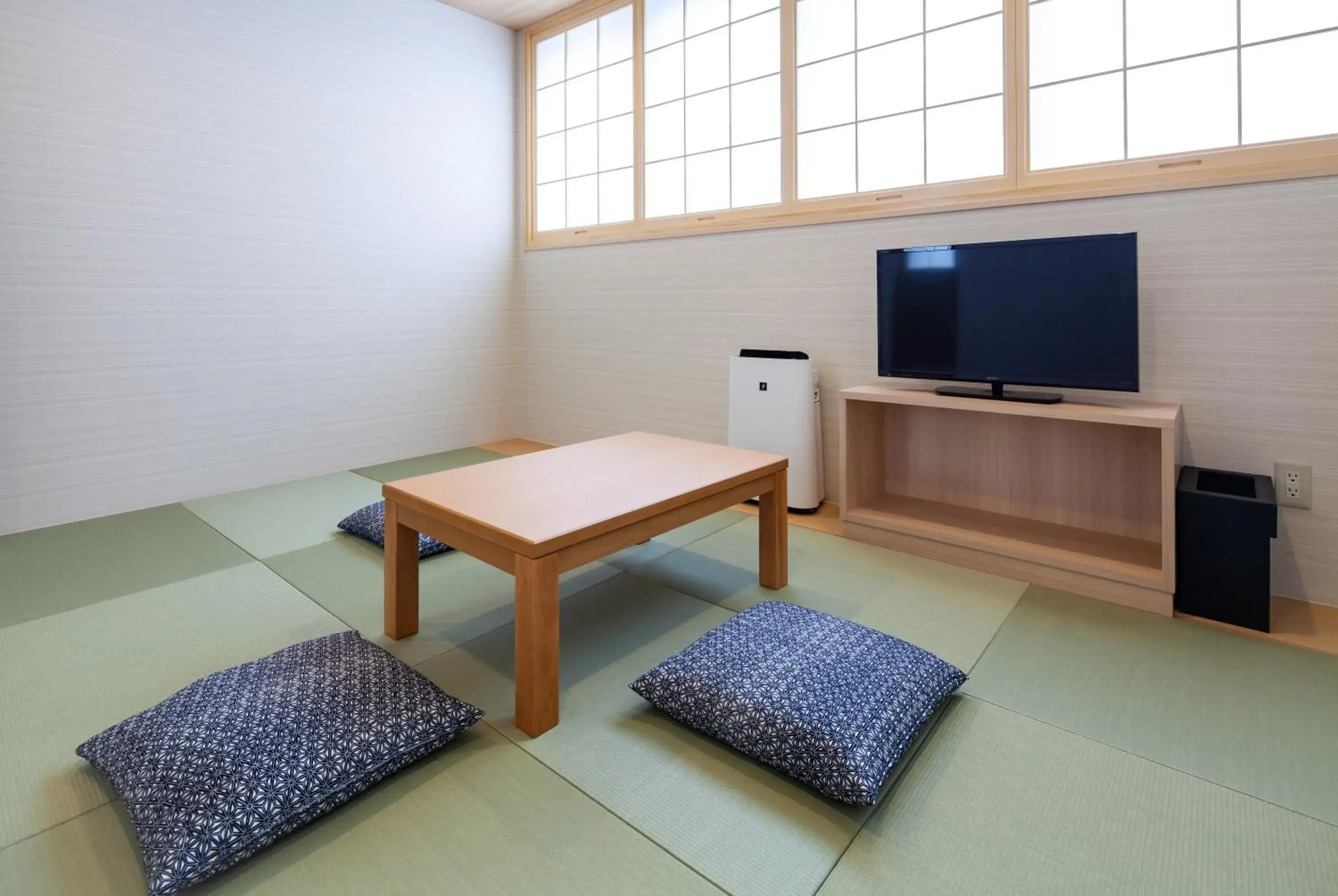 Photo of the whole room, TV/Entertainment Center in Y's CABIN&HOTEL Naha Kokusai Street