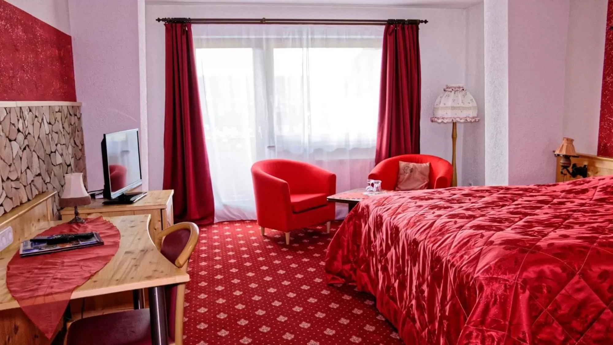 Bed in Öko-Landhotel Basler Hof