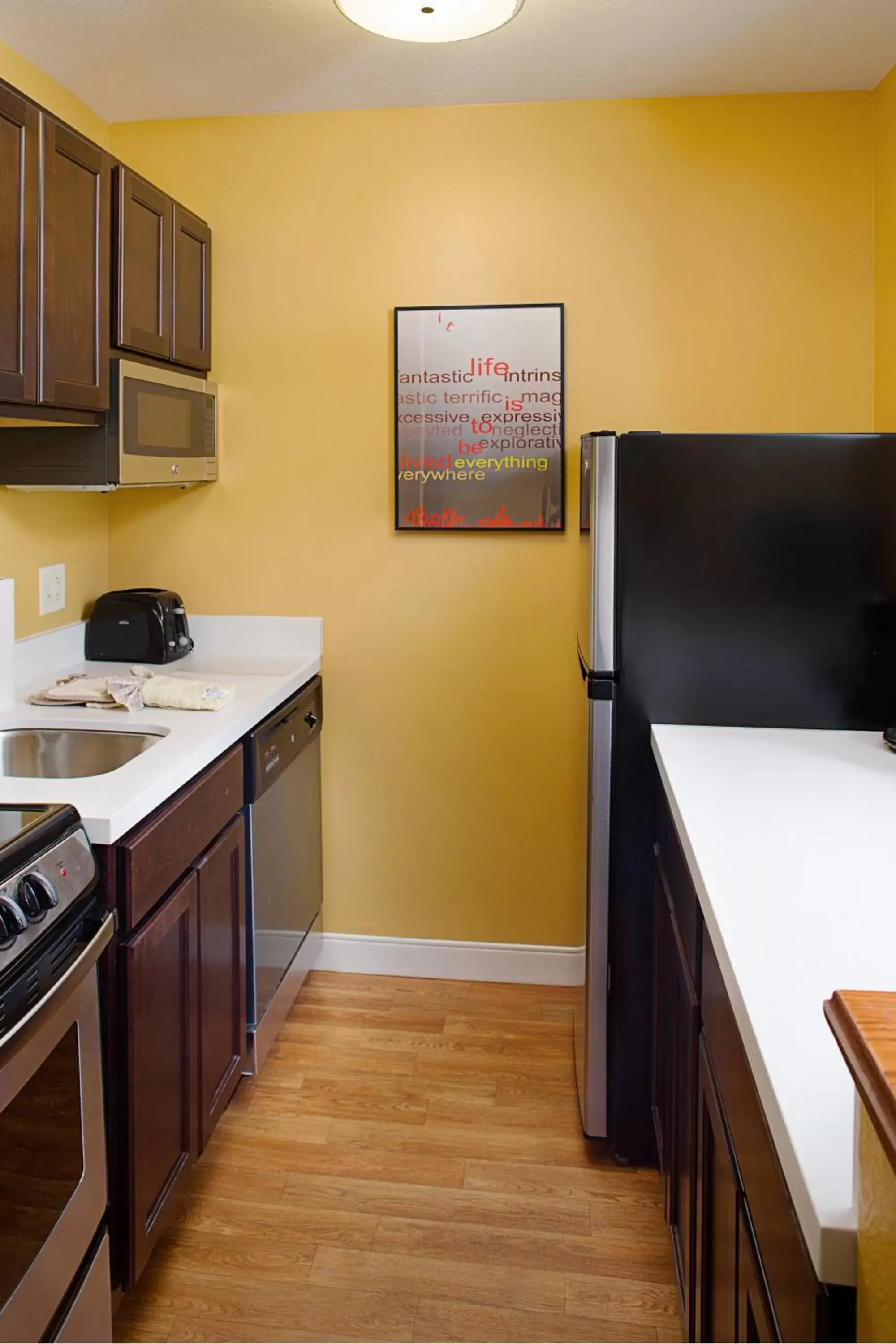 Kitchen or kitchenette, Kitchen/Kitchenette in TownePlace Suites Manchester-Boston Regional Airport