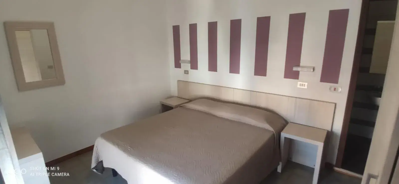 Bed in Hotel Orlov Rimini