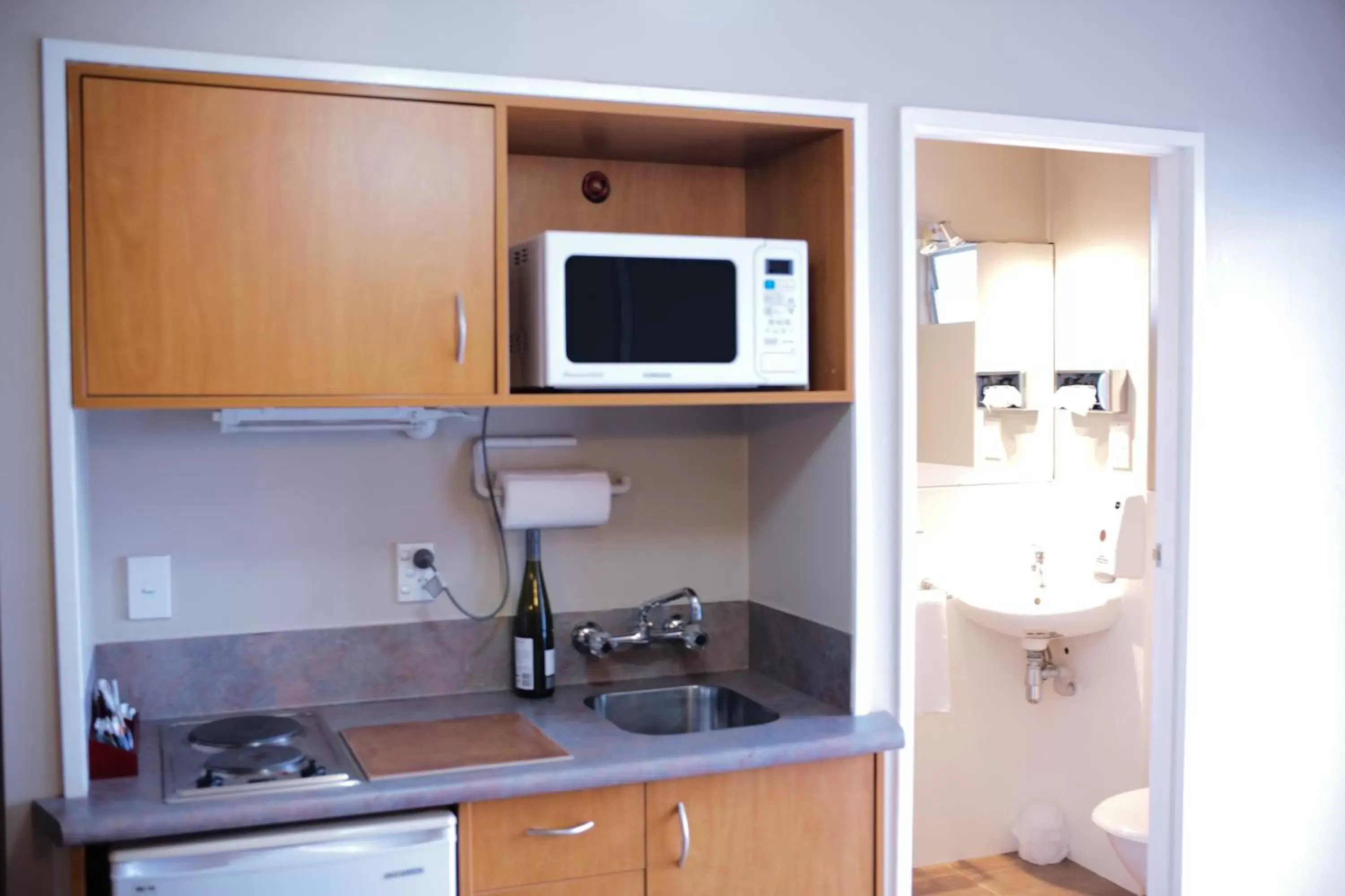 Kitchen/Kitchenette in Kiwi Studios Motel