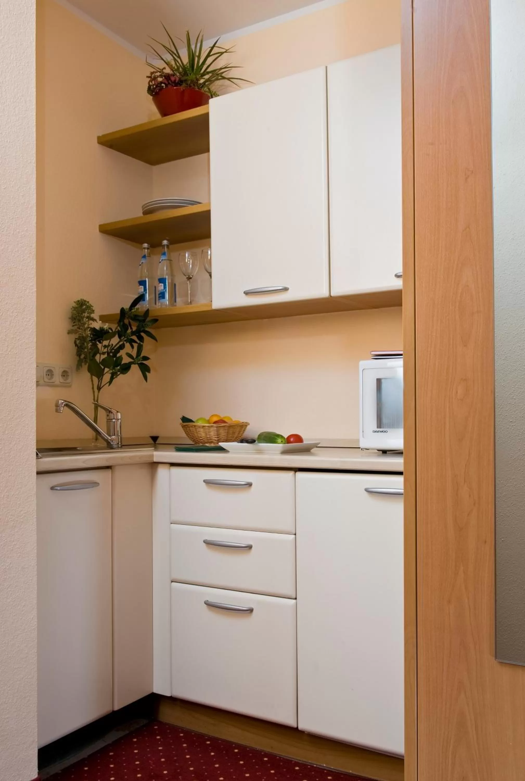 Kitchen or kitchenette in AZIMUT Hotel Erding