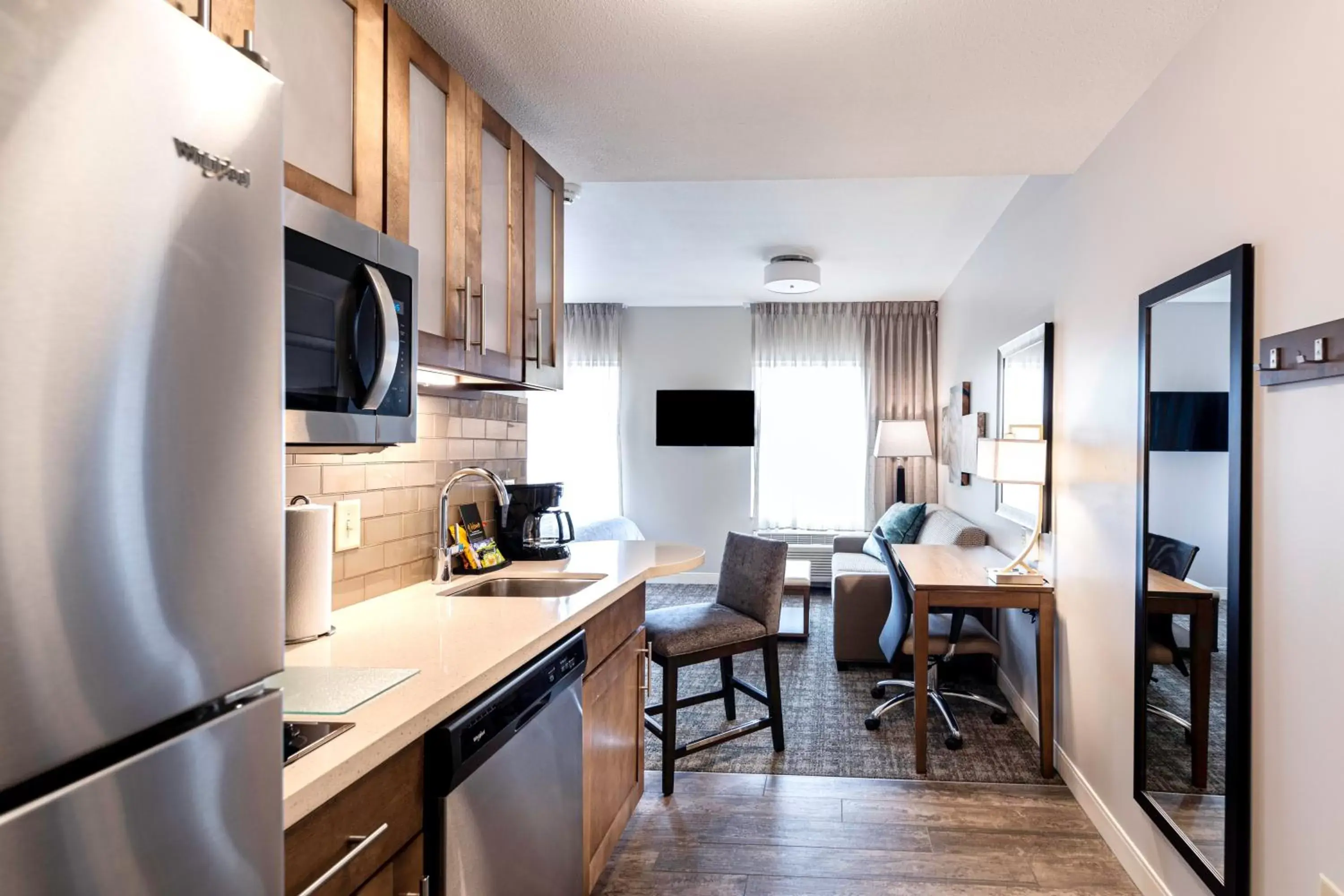 Photo of the whole room, Kitchen/Kitchenette in Staybridge Suites Montgomery - Downtown, an IHG Hotel