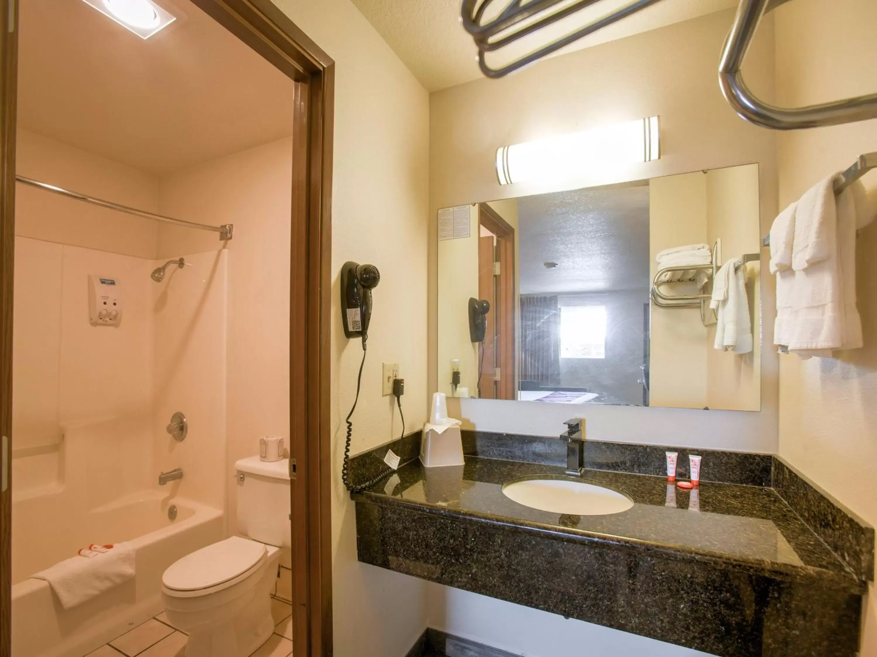 Bathroom in OYO Woodland Hotel and Suites