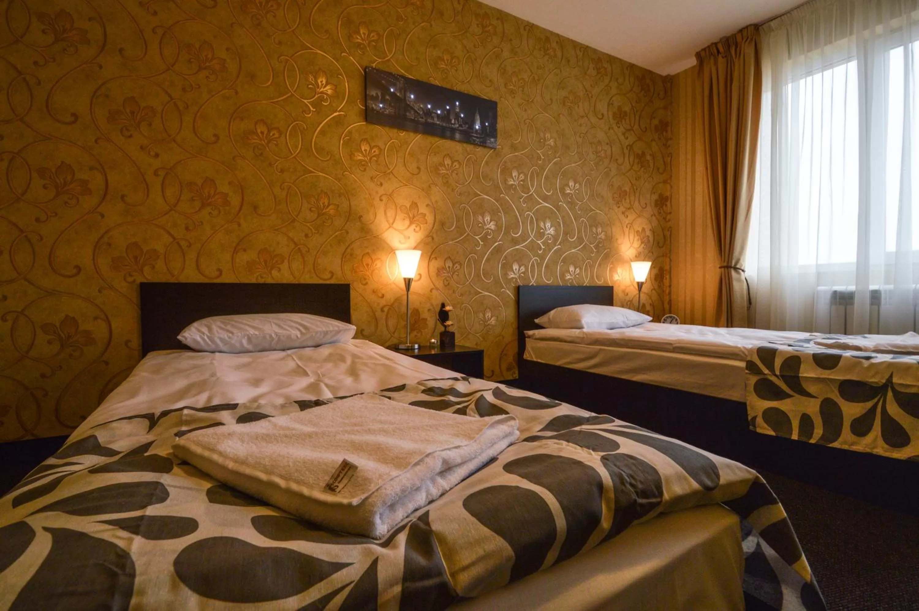 Bed in Elite Spetema Hotel