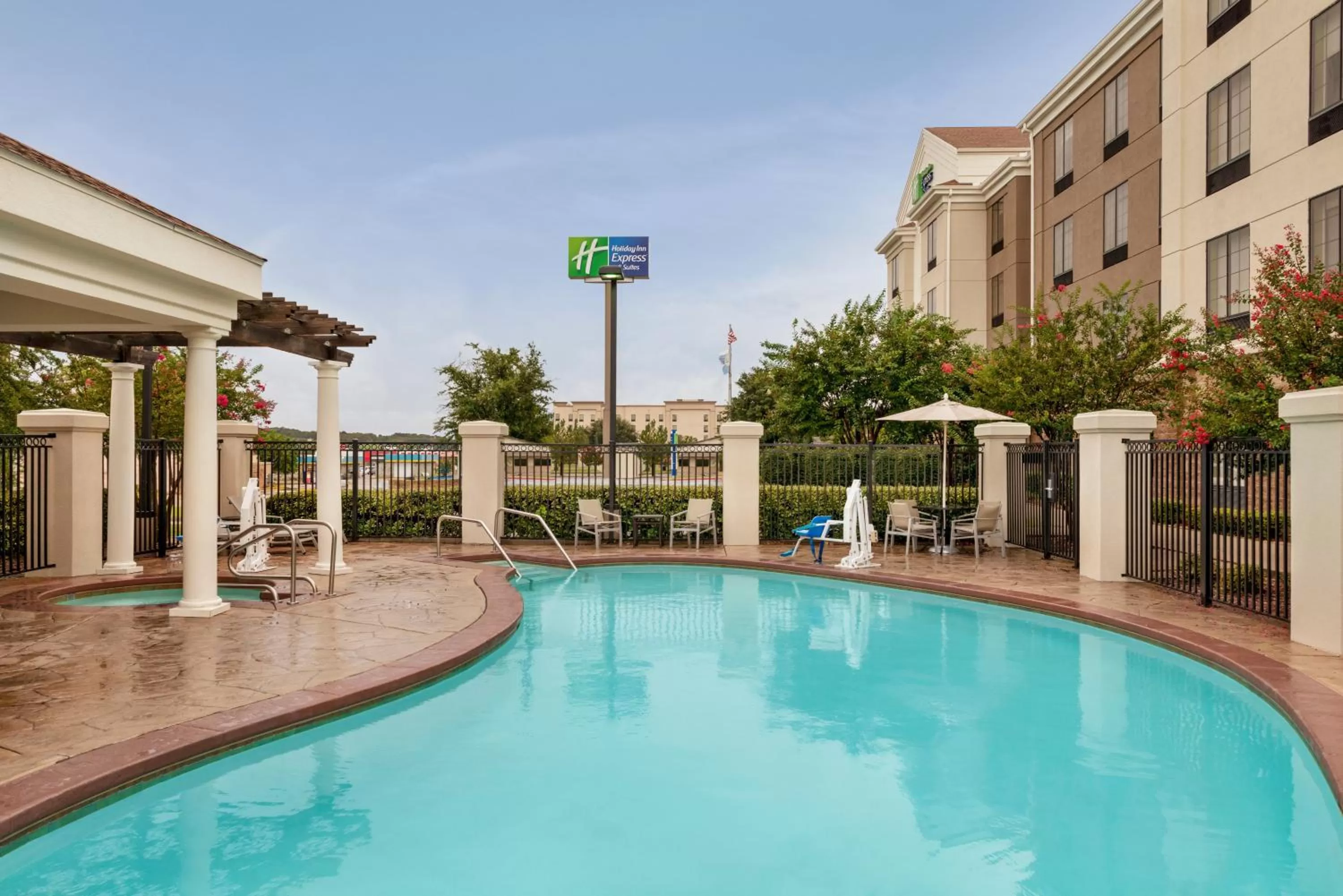 Swimming pool in Holiday Inn Express Hotel & Suites McAlester by IHG