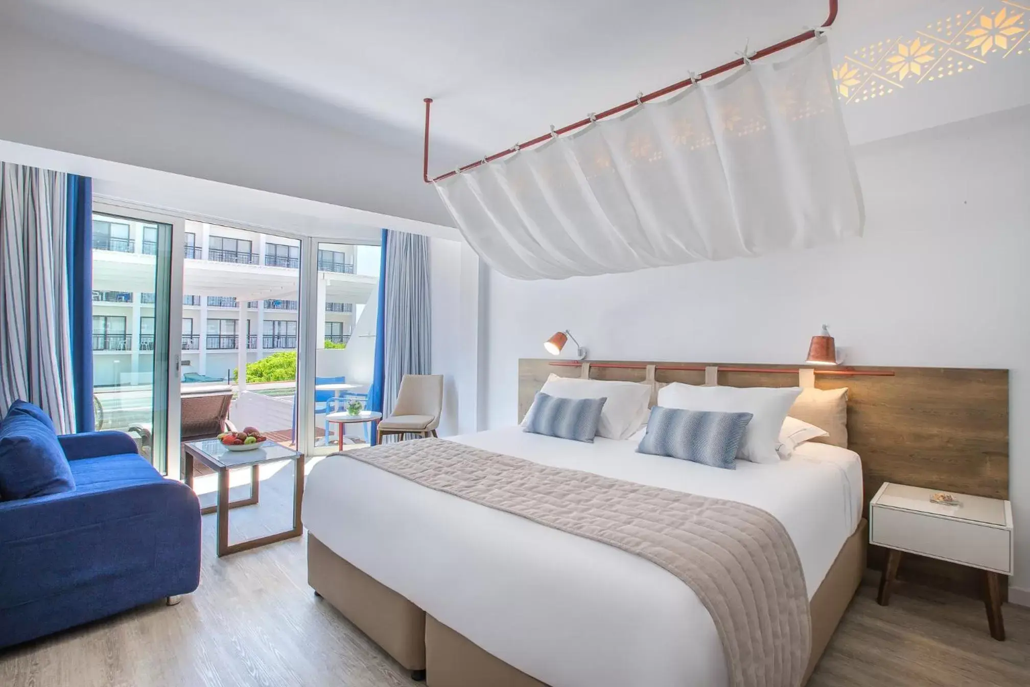 Bedroom, Bed in Lordos Beach Hotel & Spa Bedroom, Bed in Lordos Beach Hotel & Spa