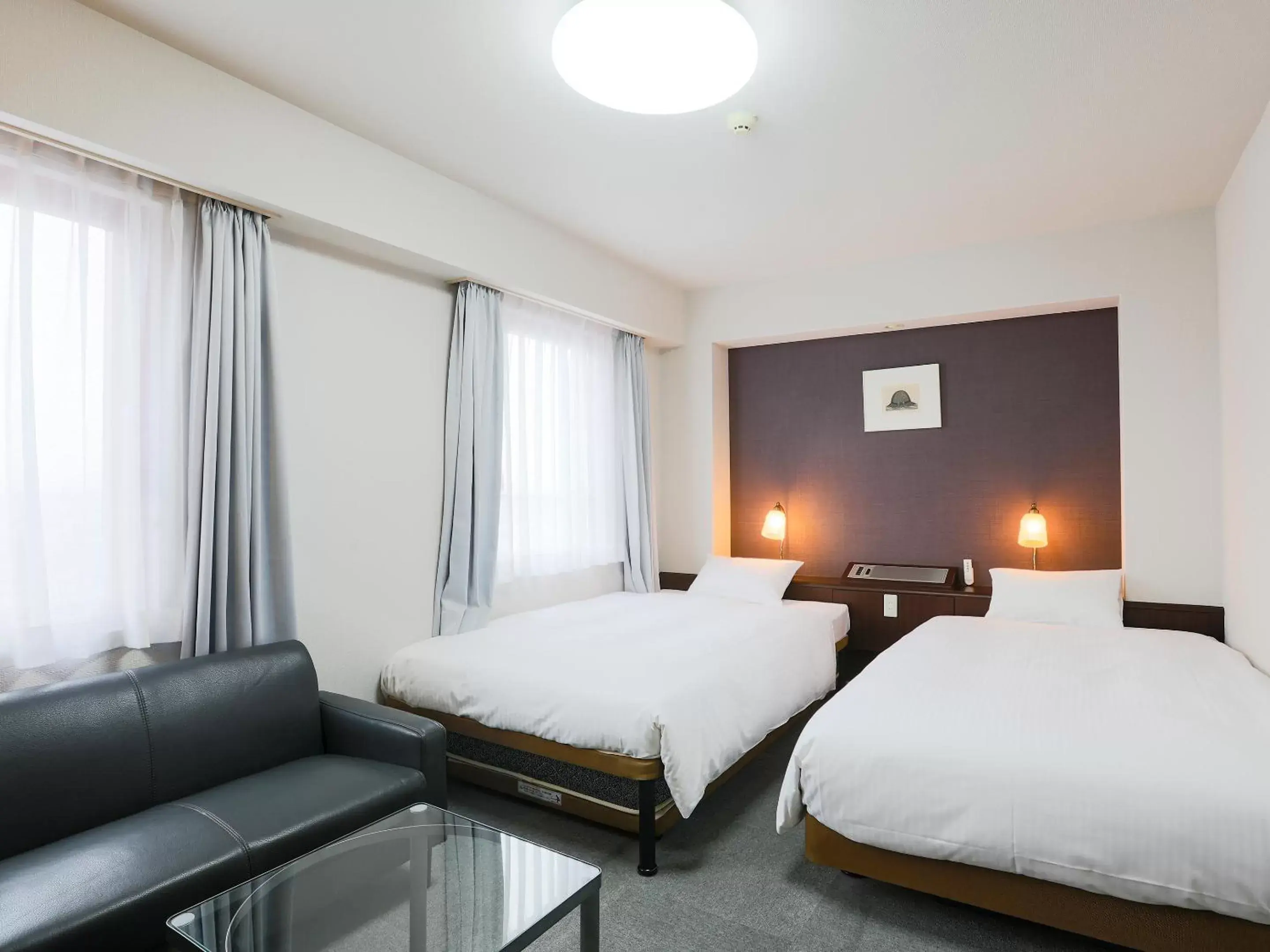 Bed in Hotel Wing International Miyakonojo