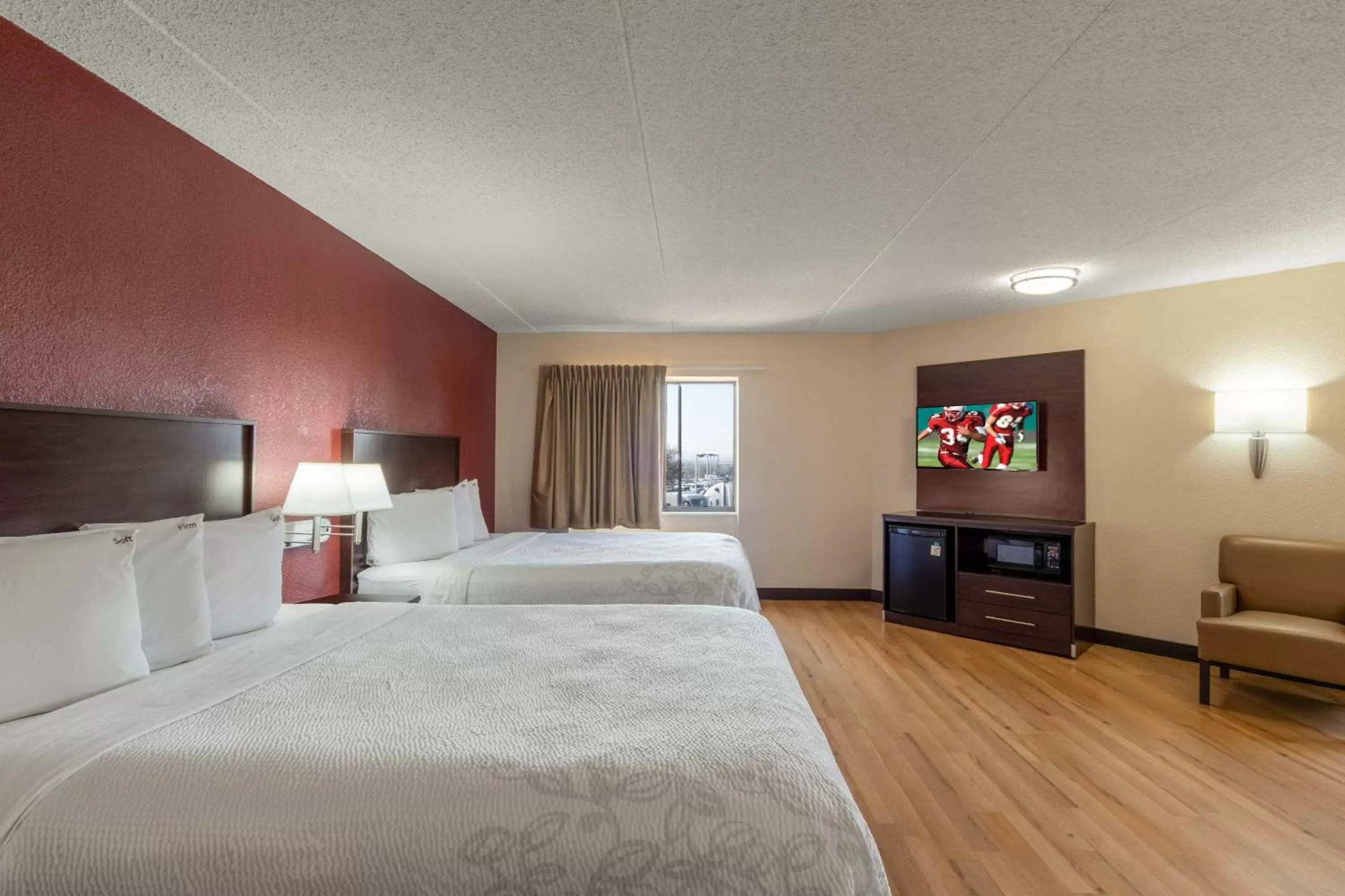Photo of the whole room, TV/Entertainment Center in Red Roof Inn PLUS+ El Paso East