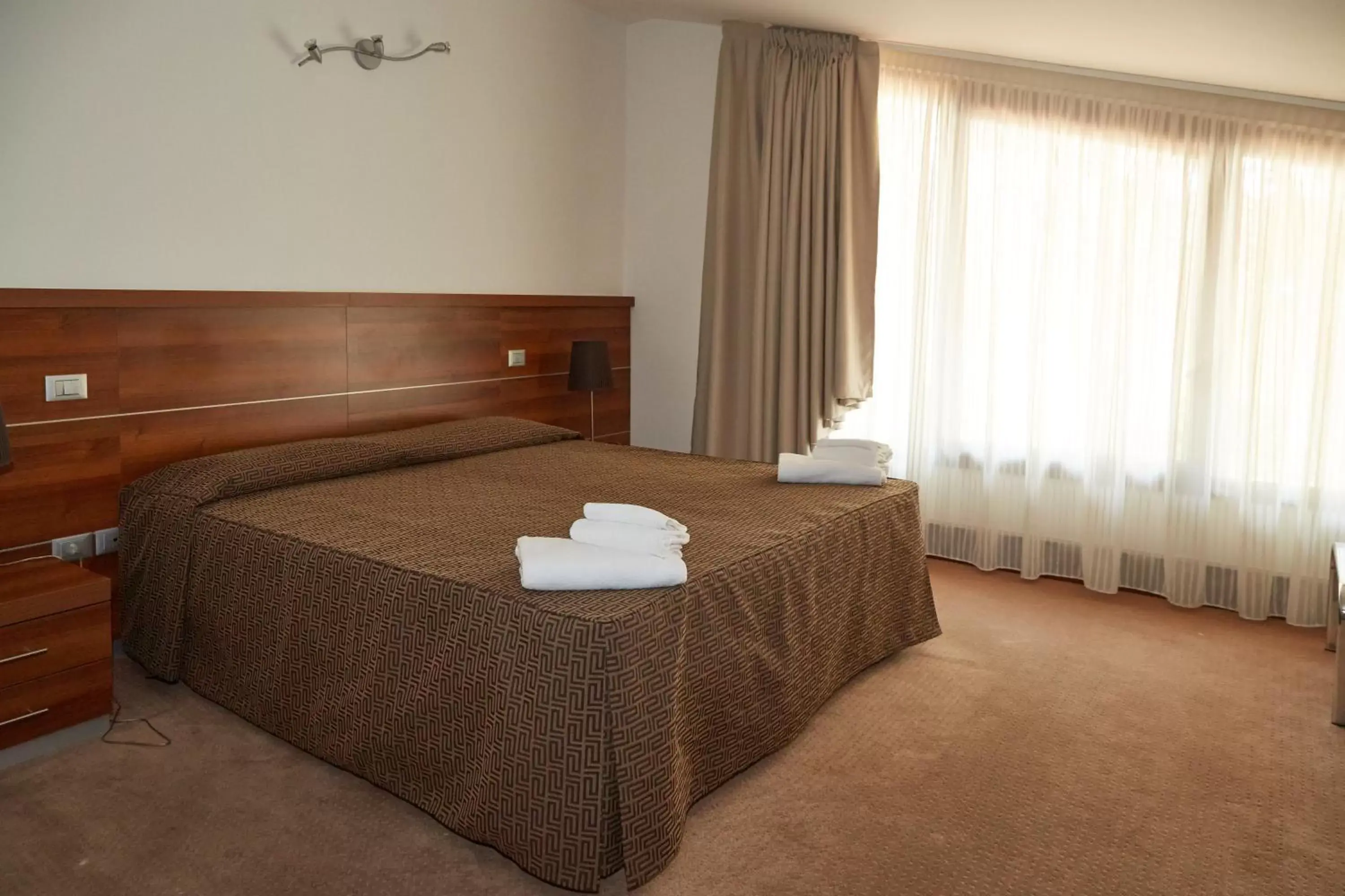 Bed in GREEN GARDEN Resort - Smart Hotel