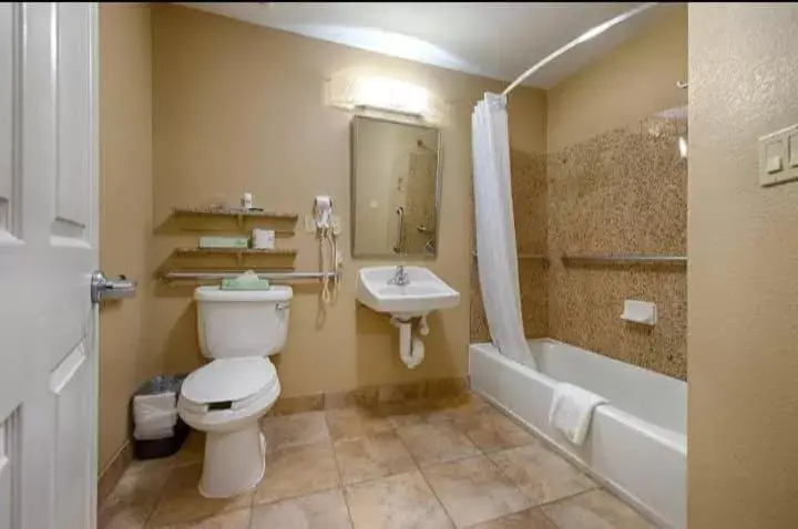 Toilet, Bathroom in Candlewood Suites Houston Medical Center, an IHG Hotel