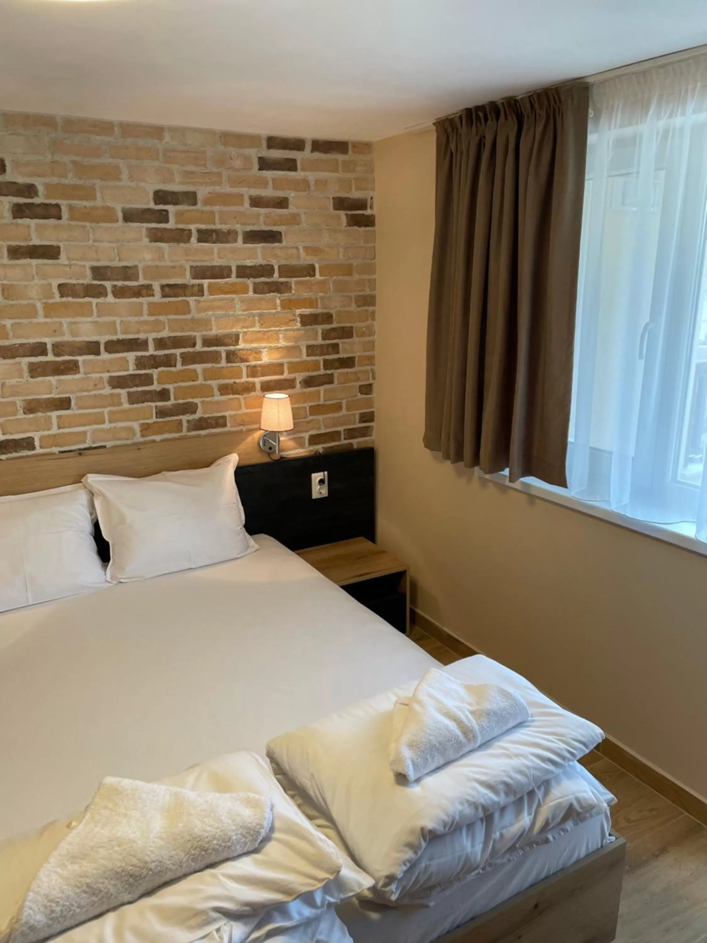 Bed in Family Hotel Malibu