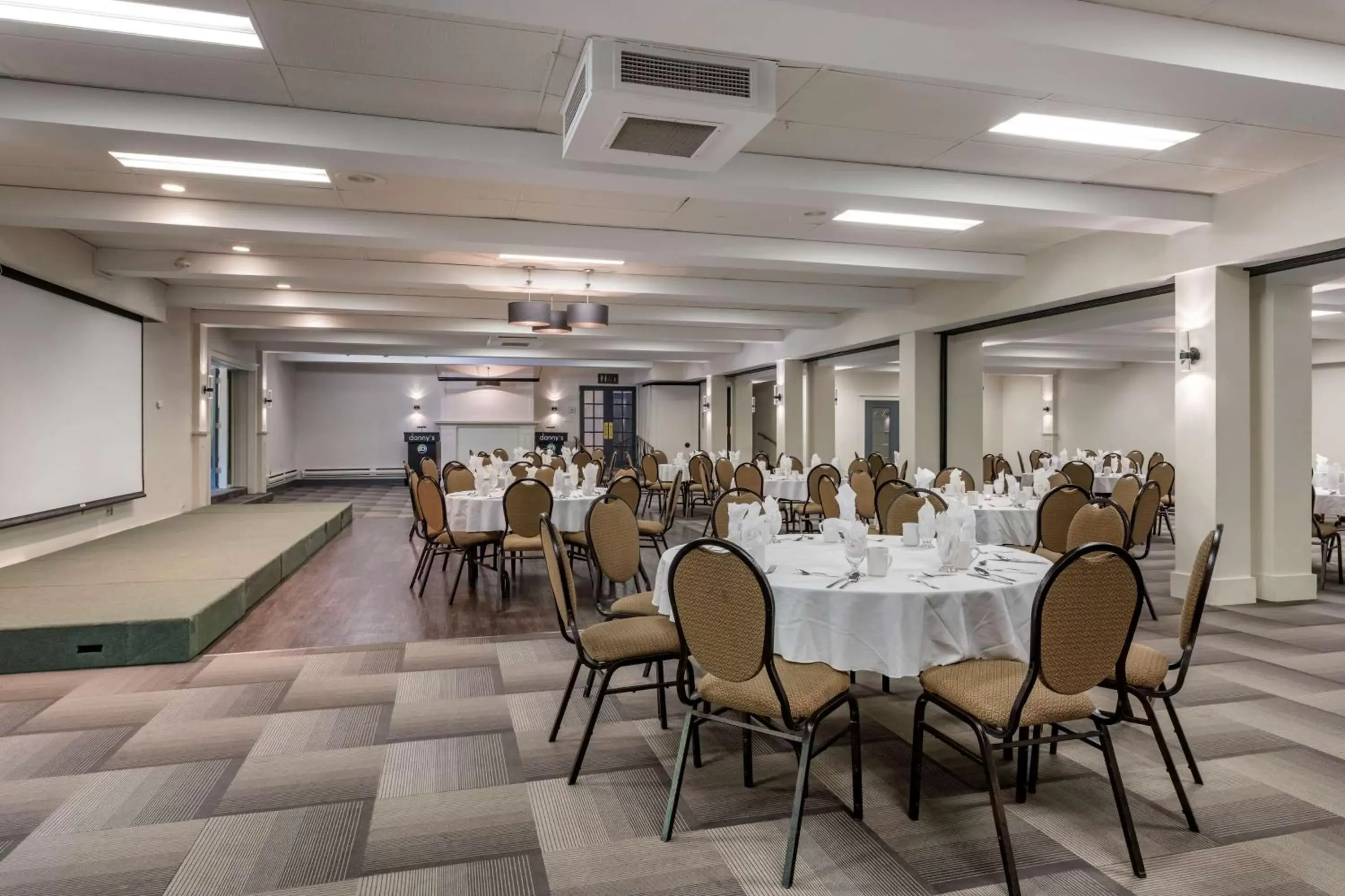 Meeting/conference room, Restaurant/Places to Eat in Dannys Hotel Suites; SureStay Collection by Best Western