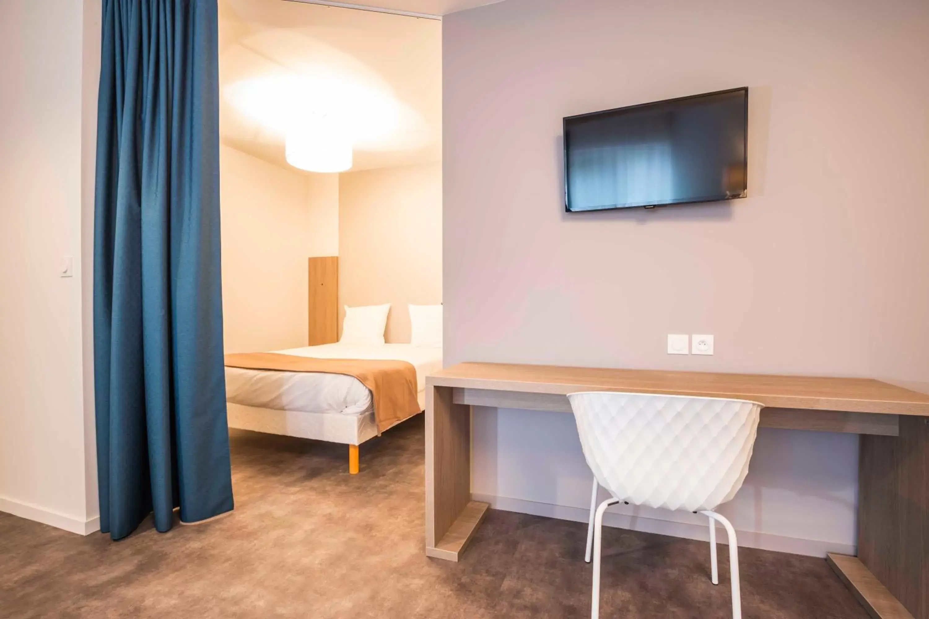 TV and multimedia, TV/Entertainment Center in Aparthotel Adagio Access Saint Nazaire