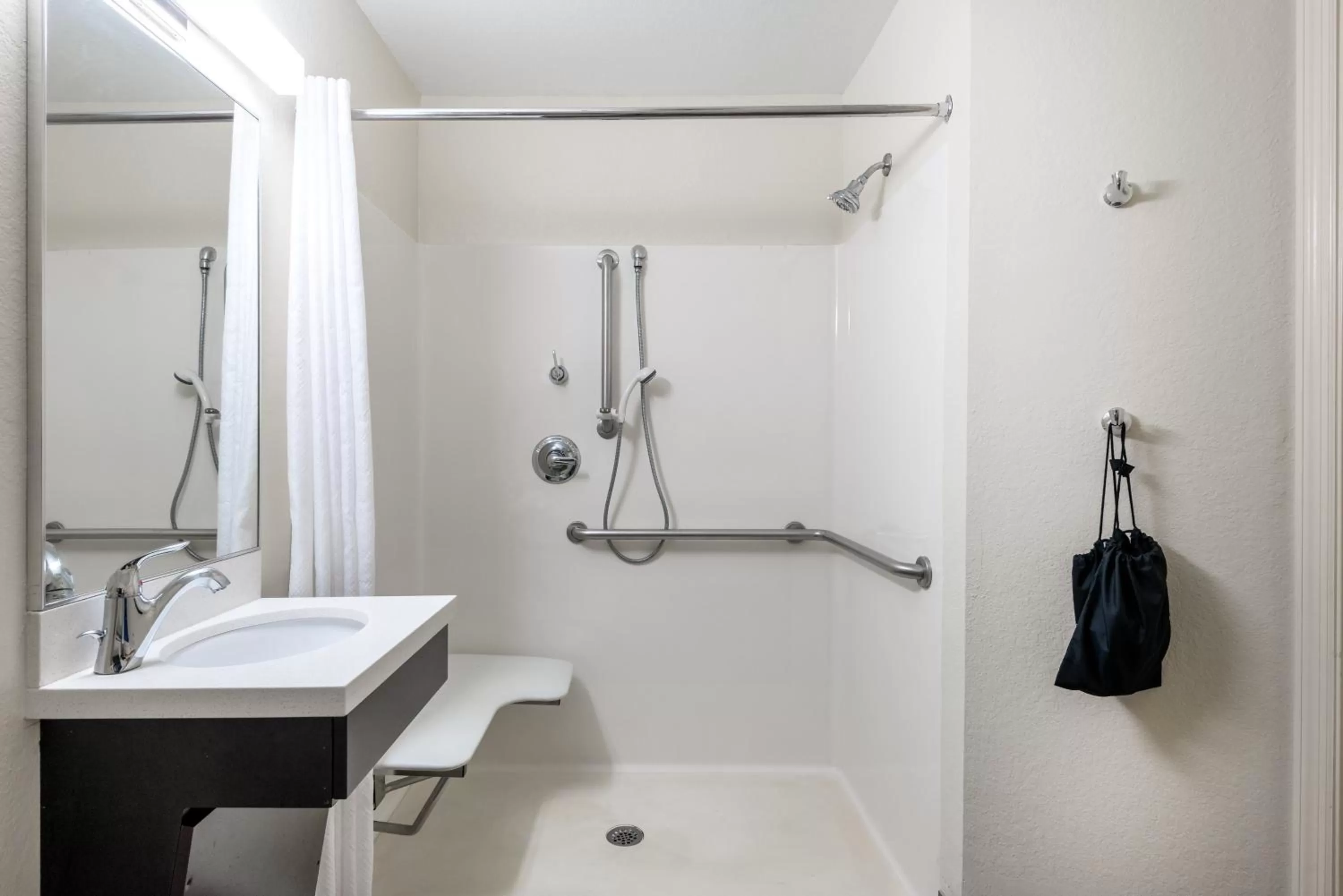 Bathroom in Candlewood Suites Lake Mary by IHG