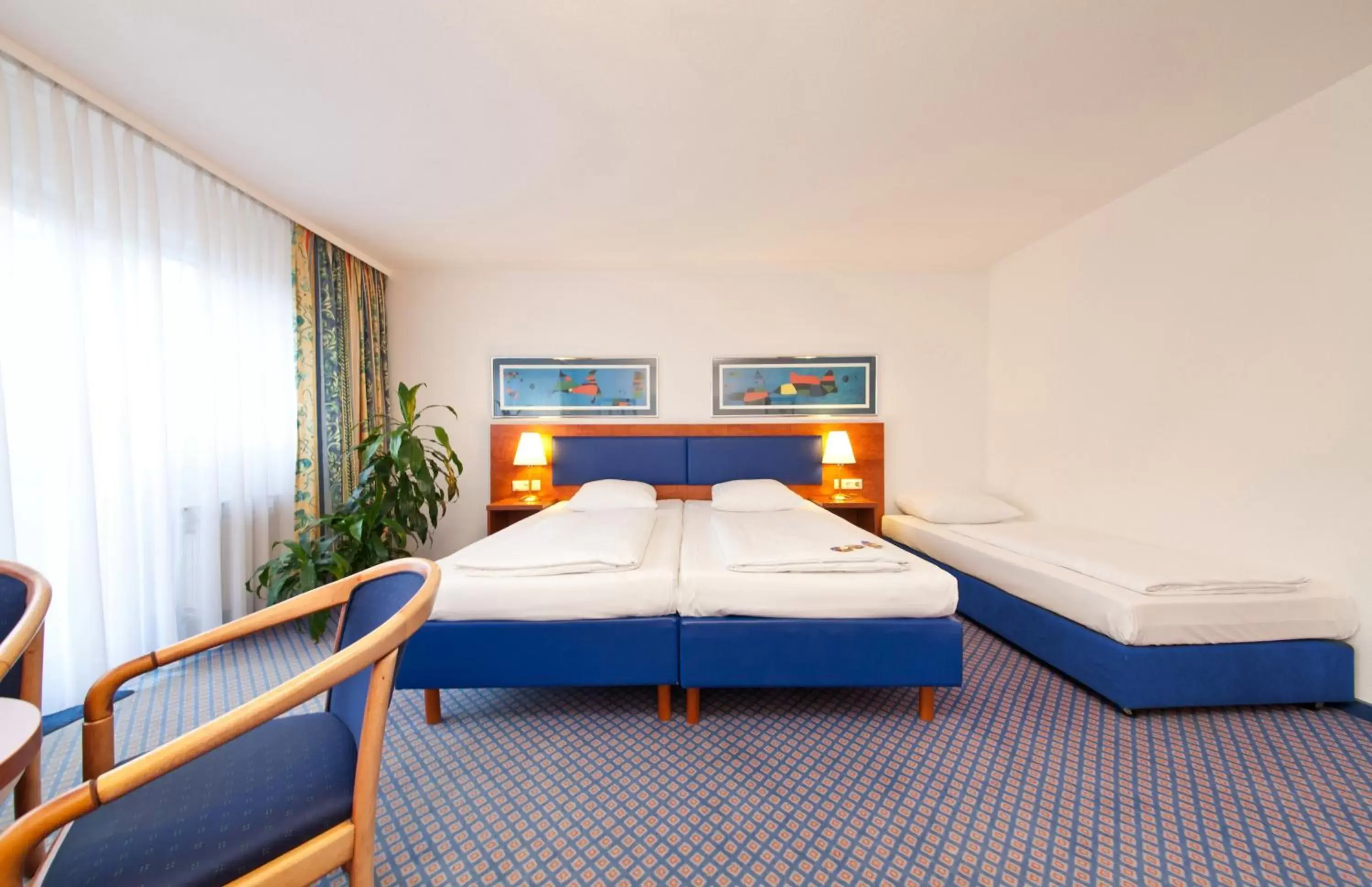 Bedroom, Bed in Novum Hotel Boulevard Stuttgart City