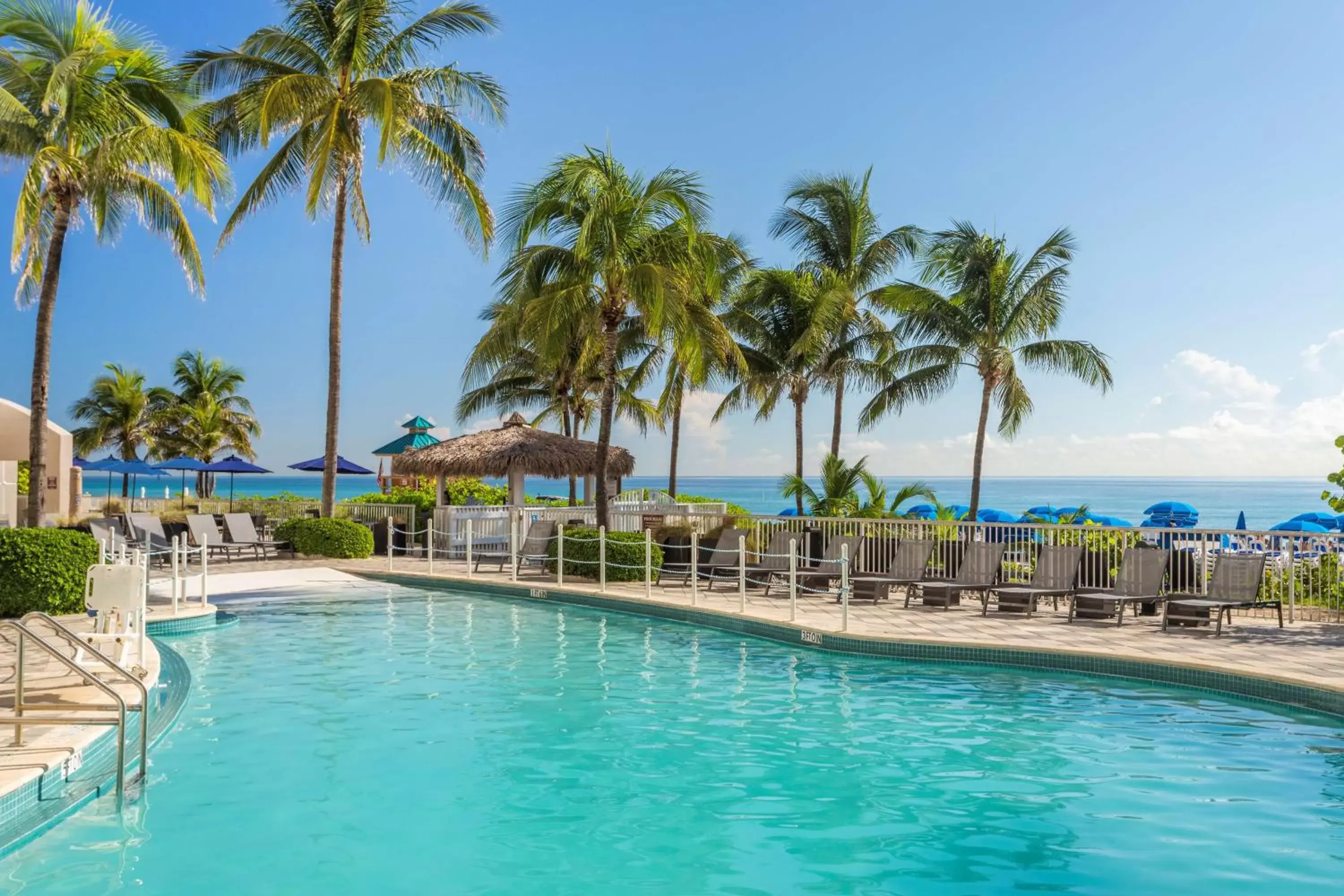 Pool view, Swimming Pool in DoubleTree by Hilton Ocean Point Resort - North Miami Beach