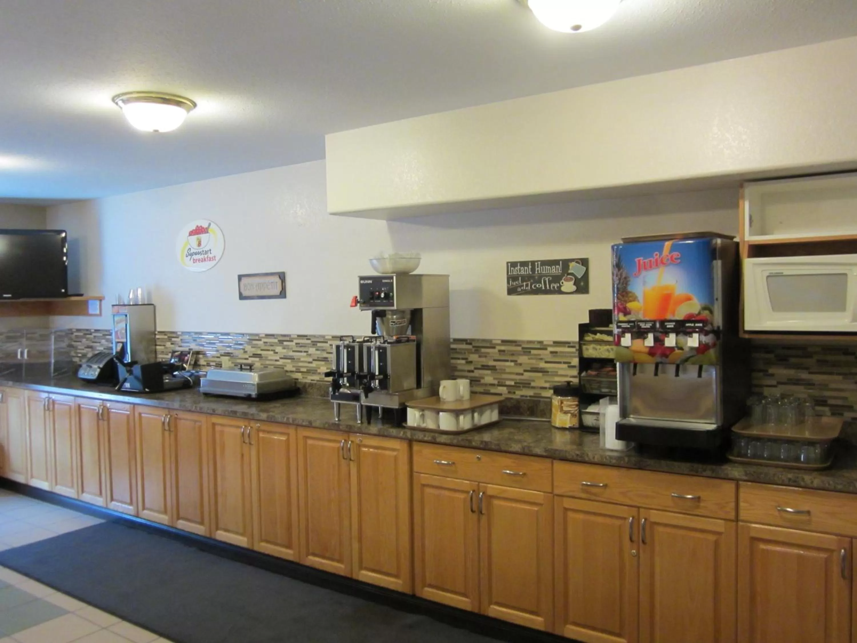 Kitchen or kitchenette in Super 8 by Wyndham Dawson Creek