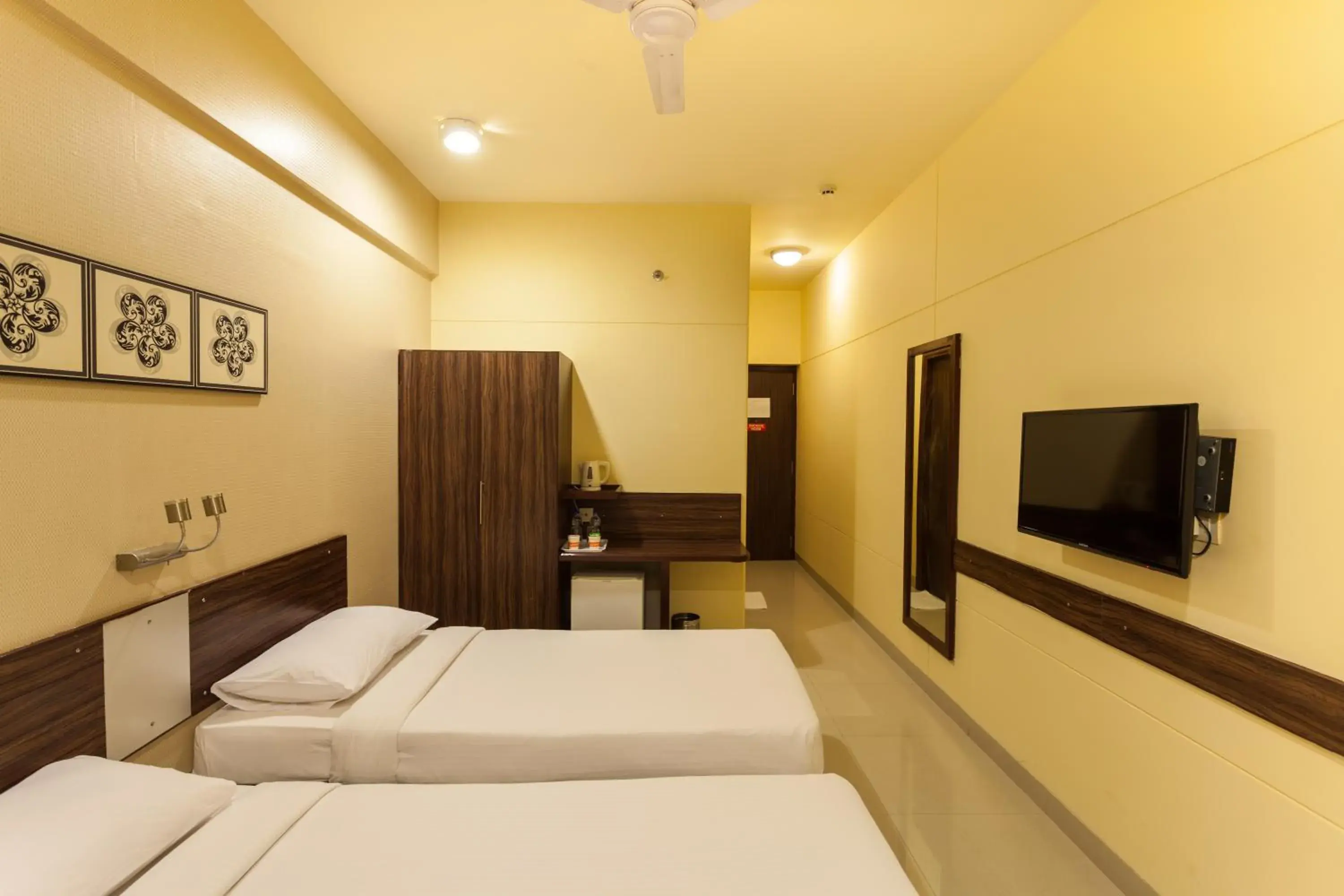 Bedroom, Bed in Ginger Hotel Surat