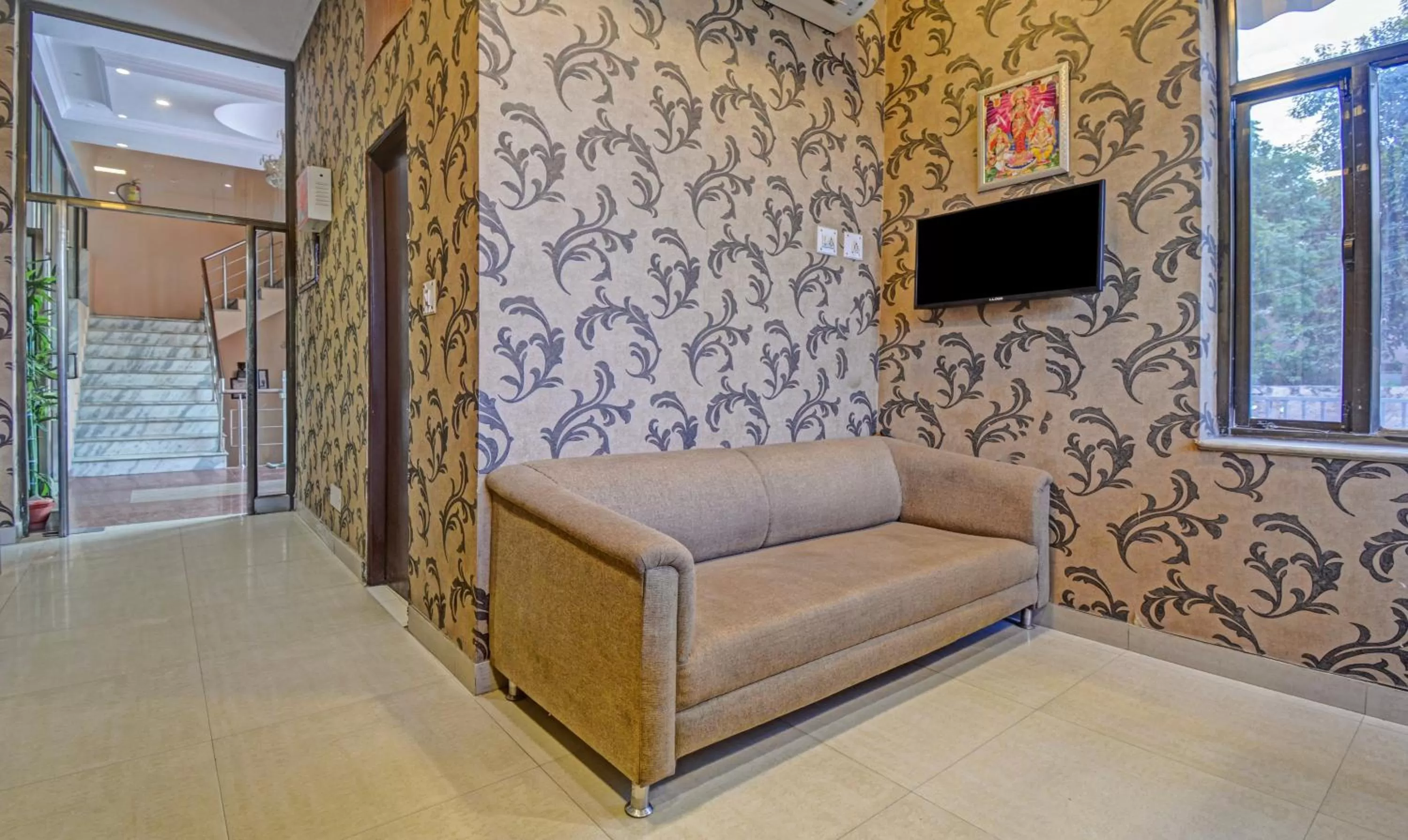 Seating area in Treebo New Rockwell Vivek Vihar