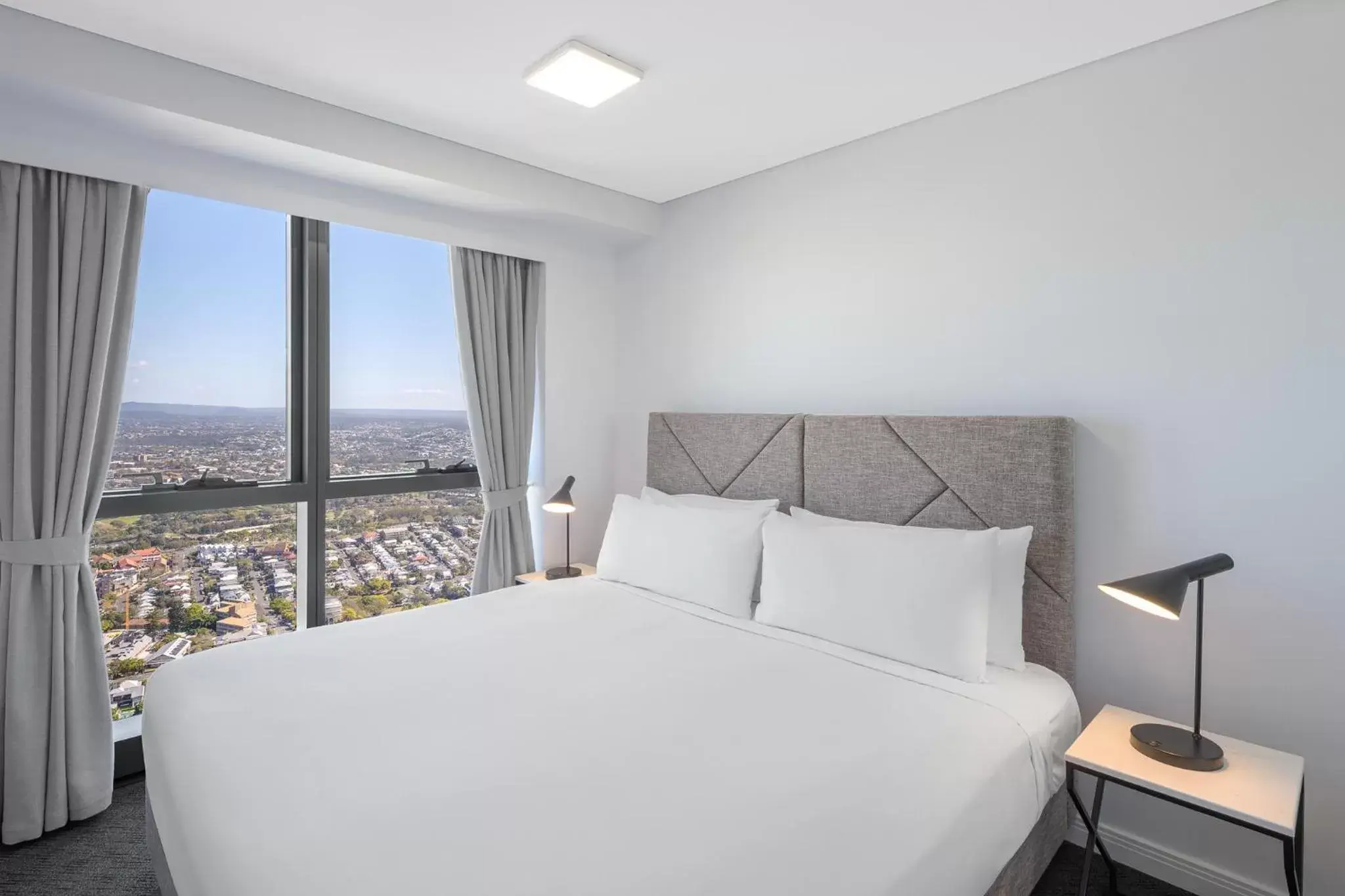 Bed in Meriton Suites Adelaide Street, Brisbane