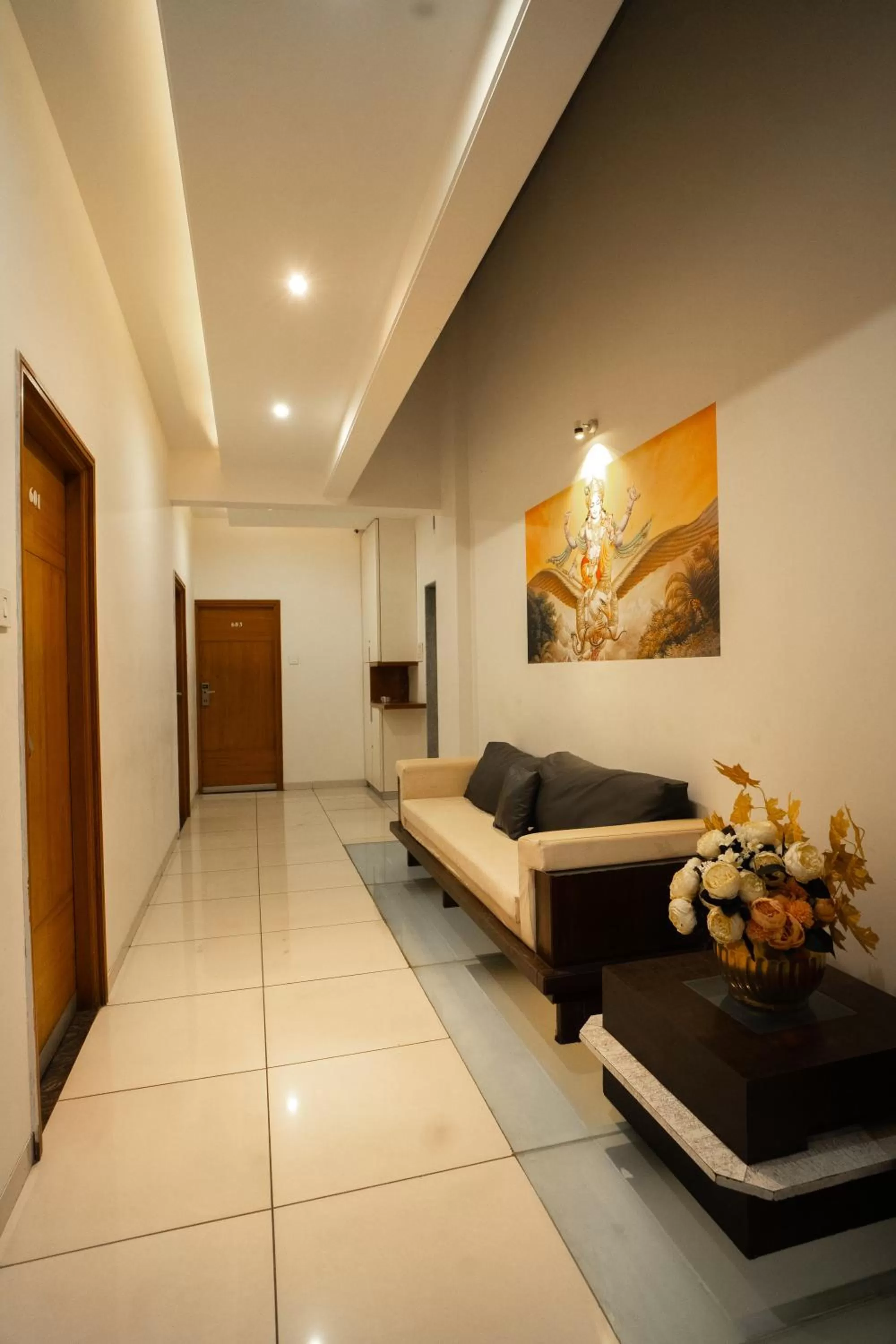 Seating area, Bed in Hotel SRI SRI EXECUTIVE KOLHAPUR NEAR MAHALAXMI TEMPLE