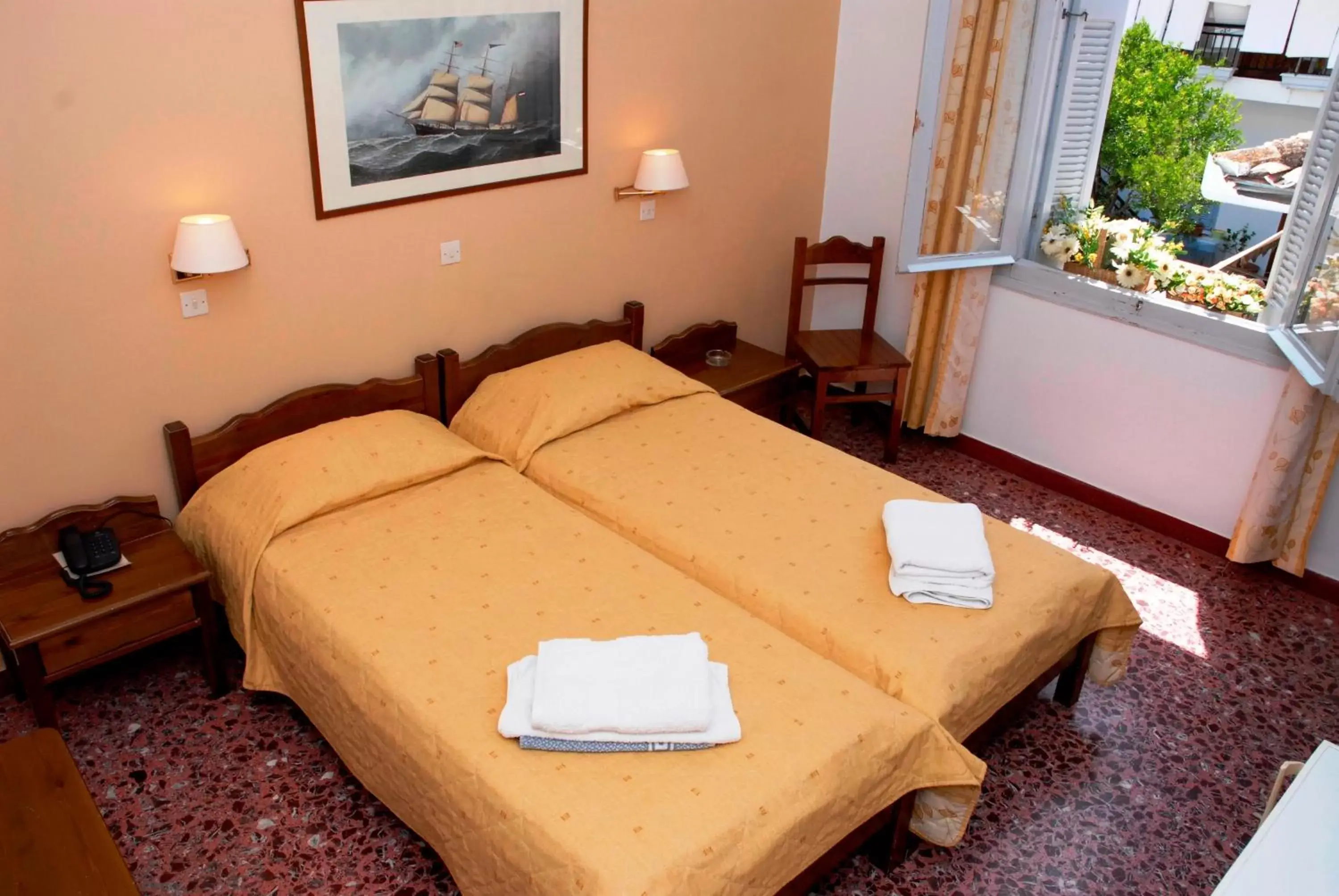 Bed in Amaryllis Hotel