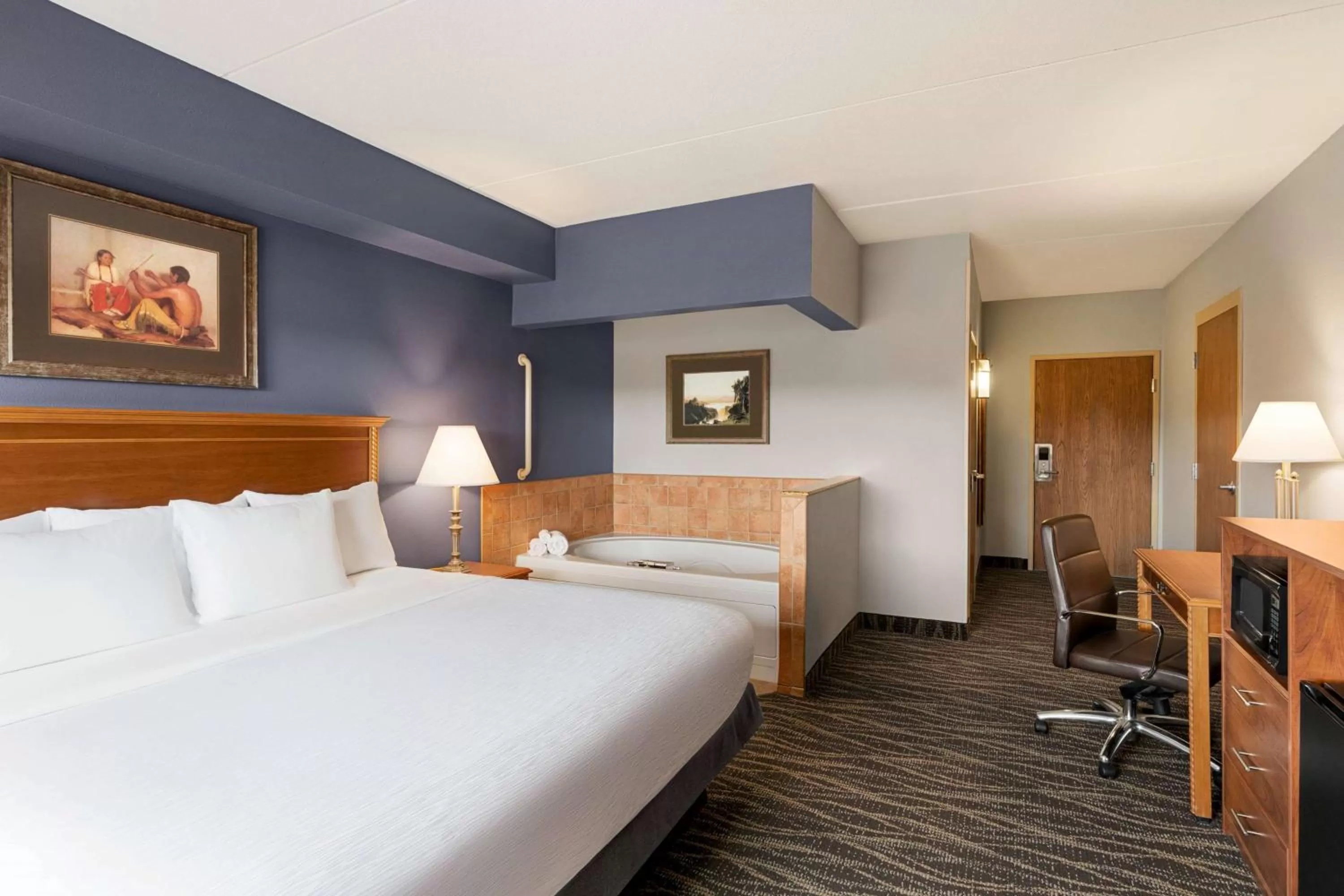 Photo of the whole room, Bed in AmericInn by Wyndham Laramie Near University of Wyoming