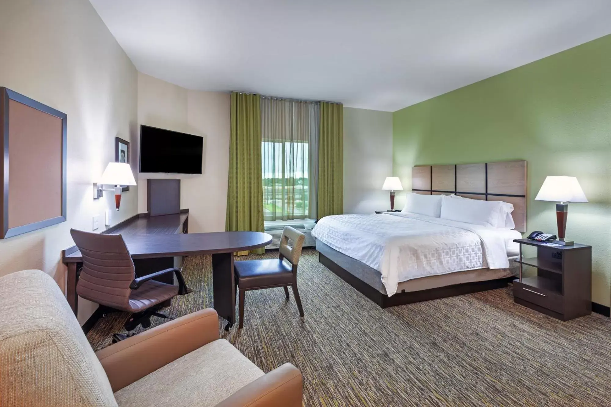 Bed in Candlewood Suites - Houston - Pasadena, an IHG Hotel